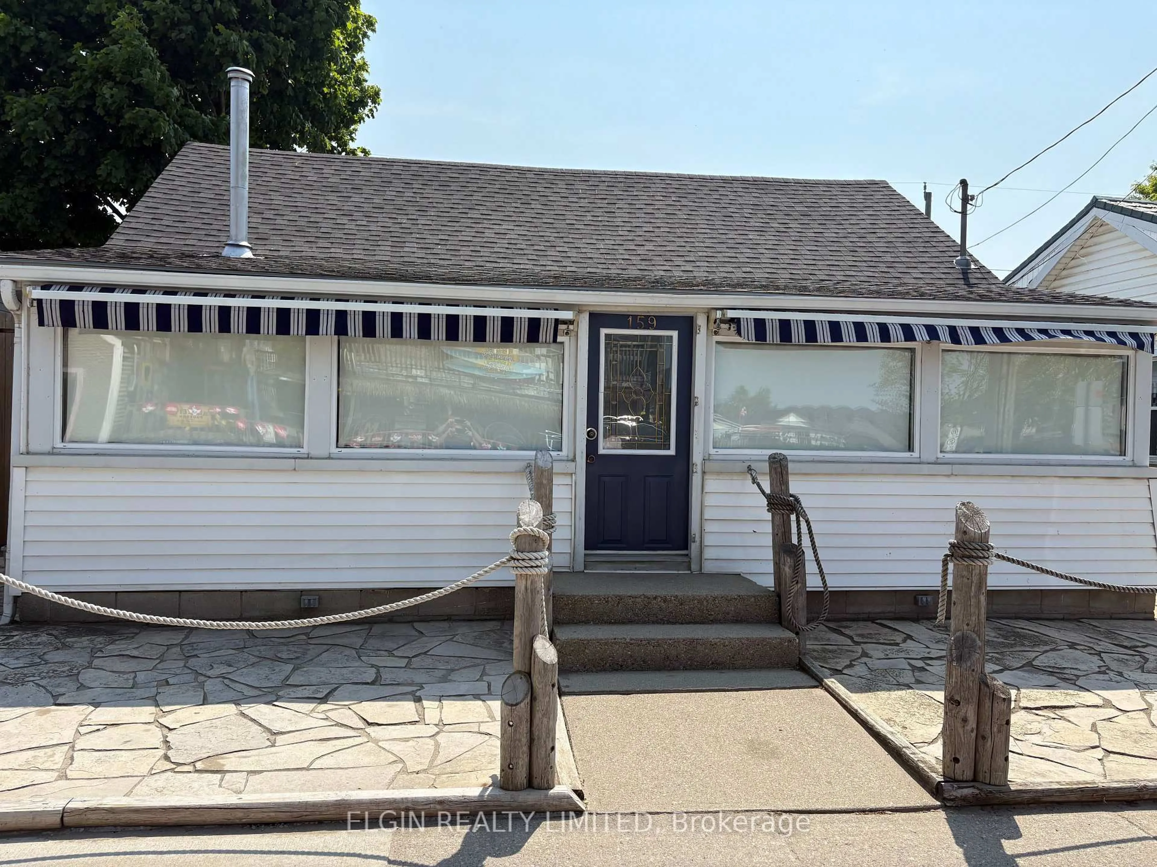 Home with vinyl exterior material, street for 159 William St, Central Elgin Ontario N5L 1C7