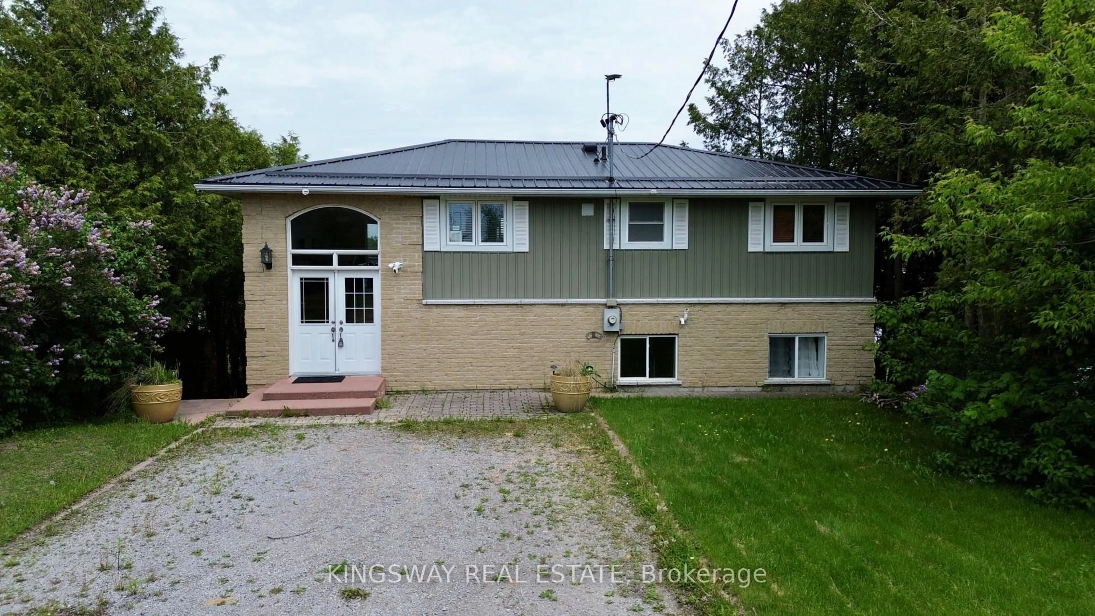 A pic from outside/outdoor area/front of a property/back of a property/a pic from drone, unknown for 18 Mitchellview Rd, Kawartha Lakes Ontario K0M 2B0