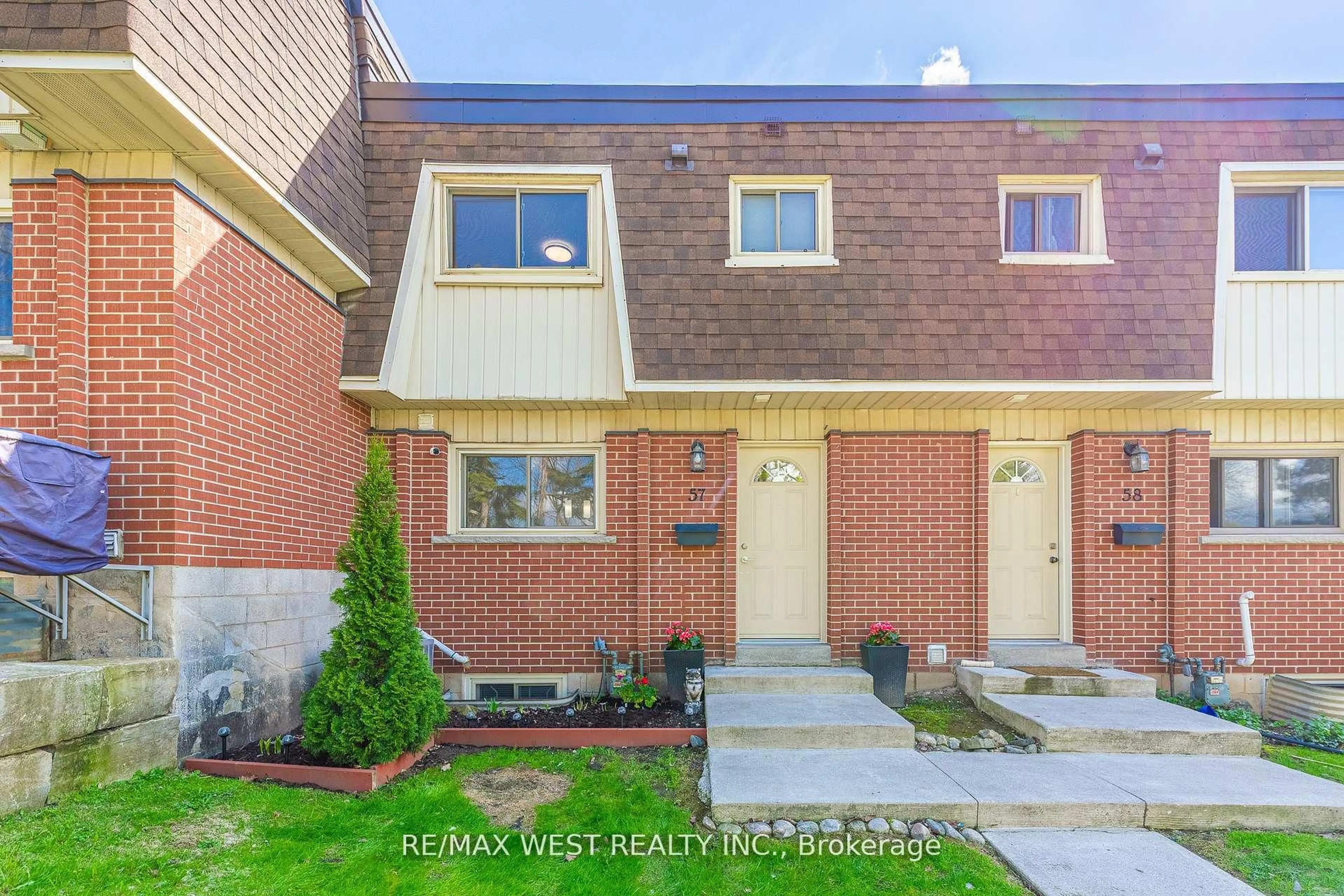 Home with brick exterior material, street for 125 Bonaventure Dr #57, Hamilton Ontario L9C 5Y9