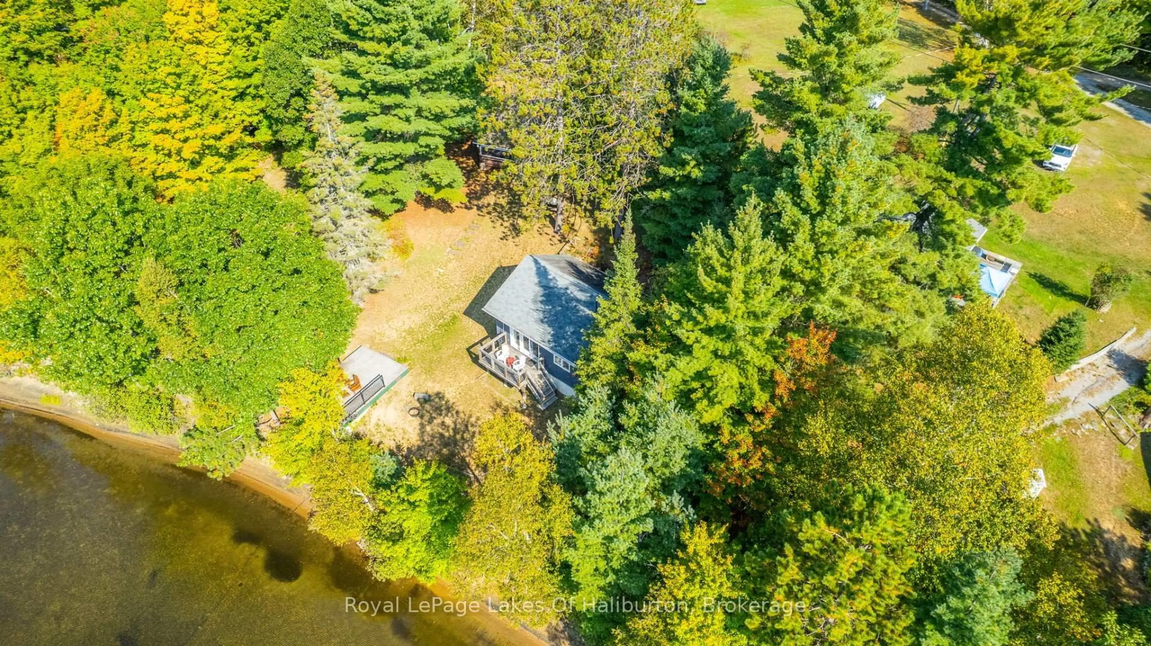 A pic from outside/outdoor area/front of a property/back of a property/a pic from drone, water/lake/river/ocean view for 1070 Frank's Lane, Algonquin Highlands Ontario K0M 1S0