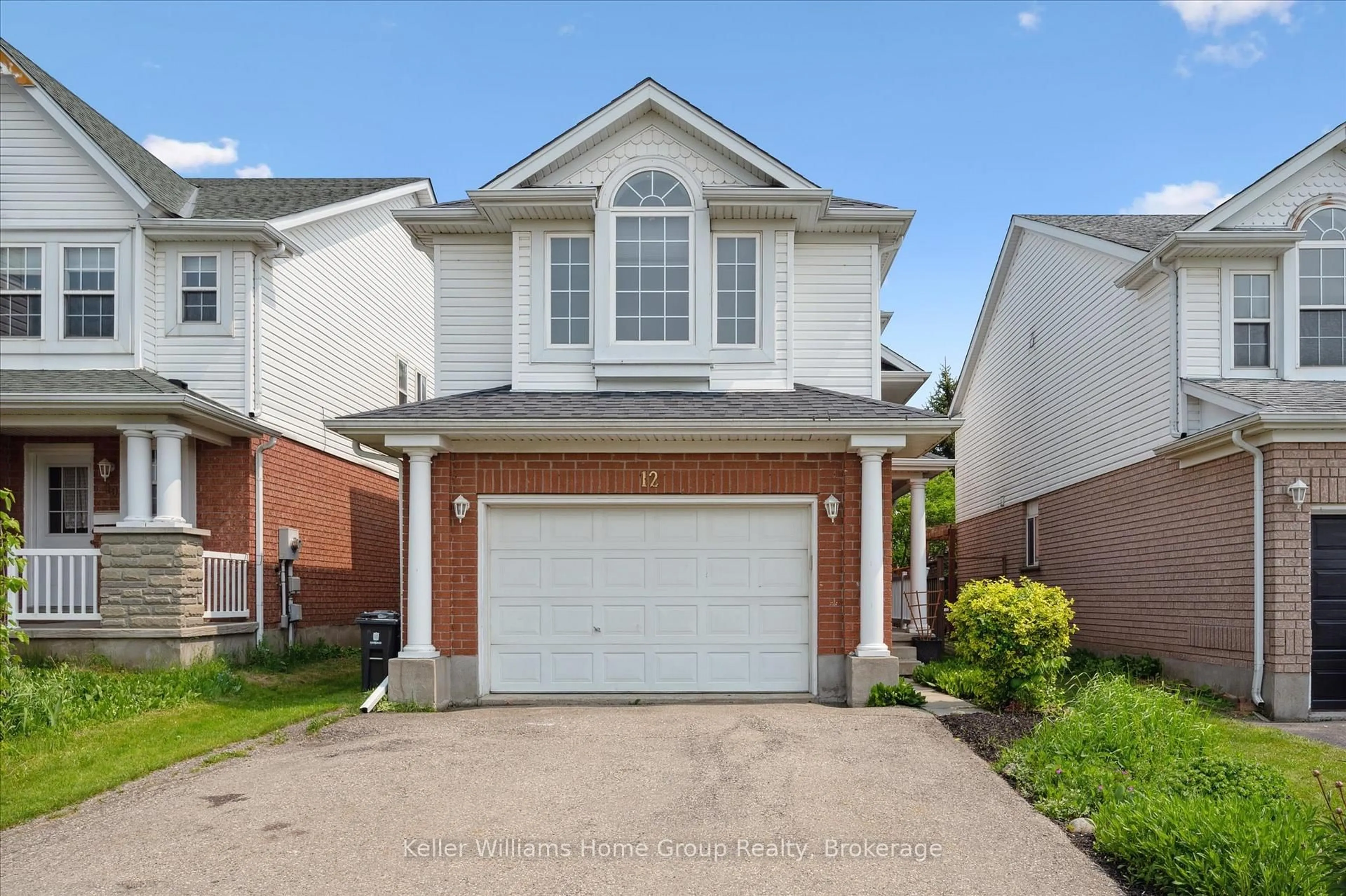 Home with vinyl exterior material, street for 12 McCurdy Rd, Guelph Ontario N1G 4Y6