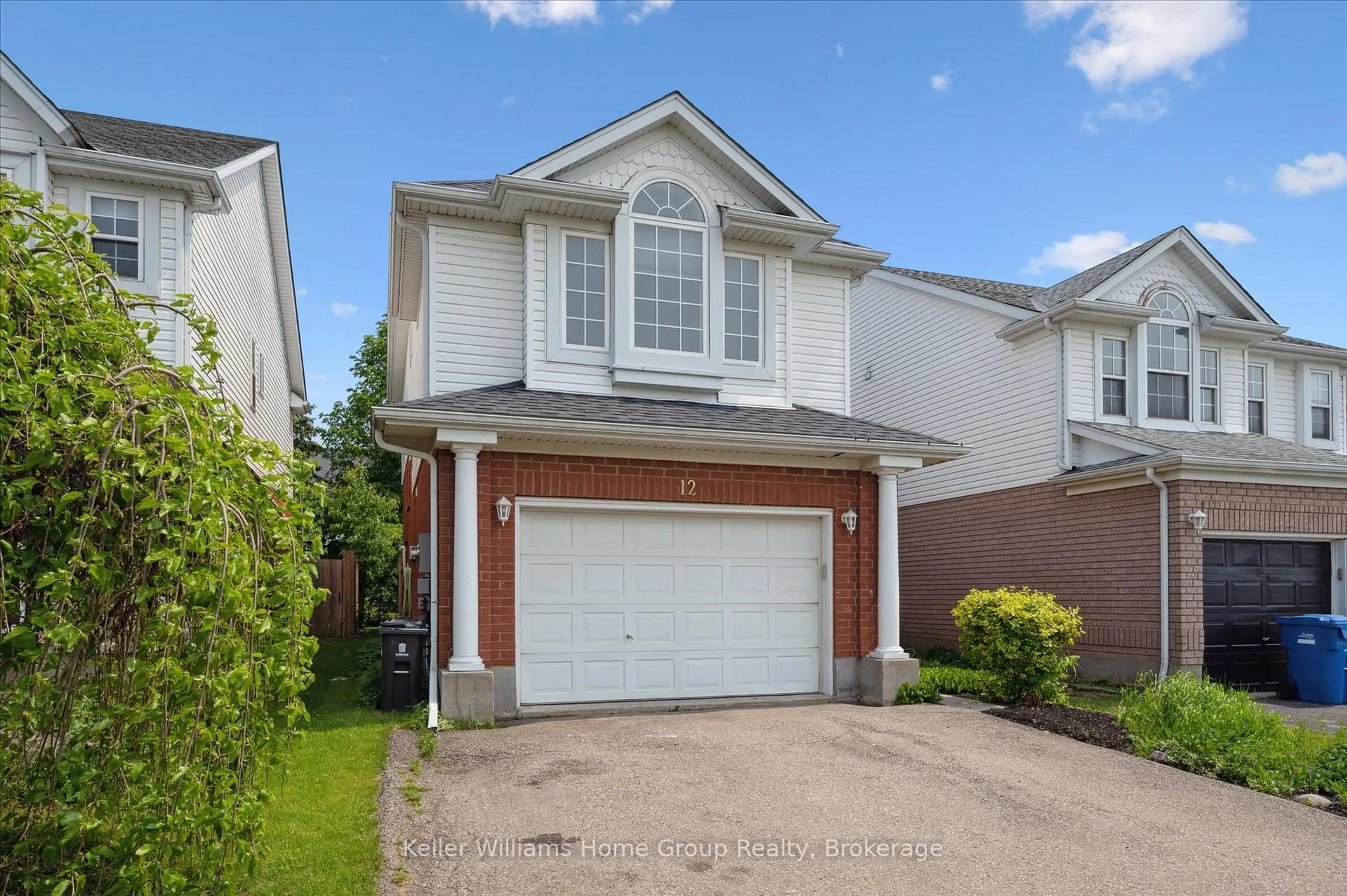 Home with vinyl exterior material, street for 12 McCurdy Rd, Guelph Ontario N1G 4Y6