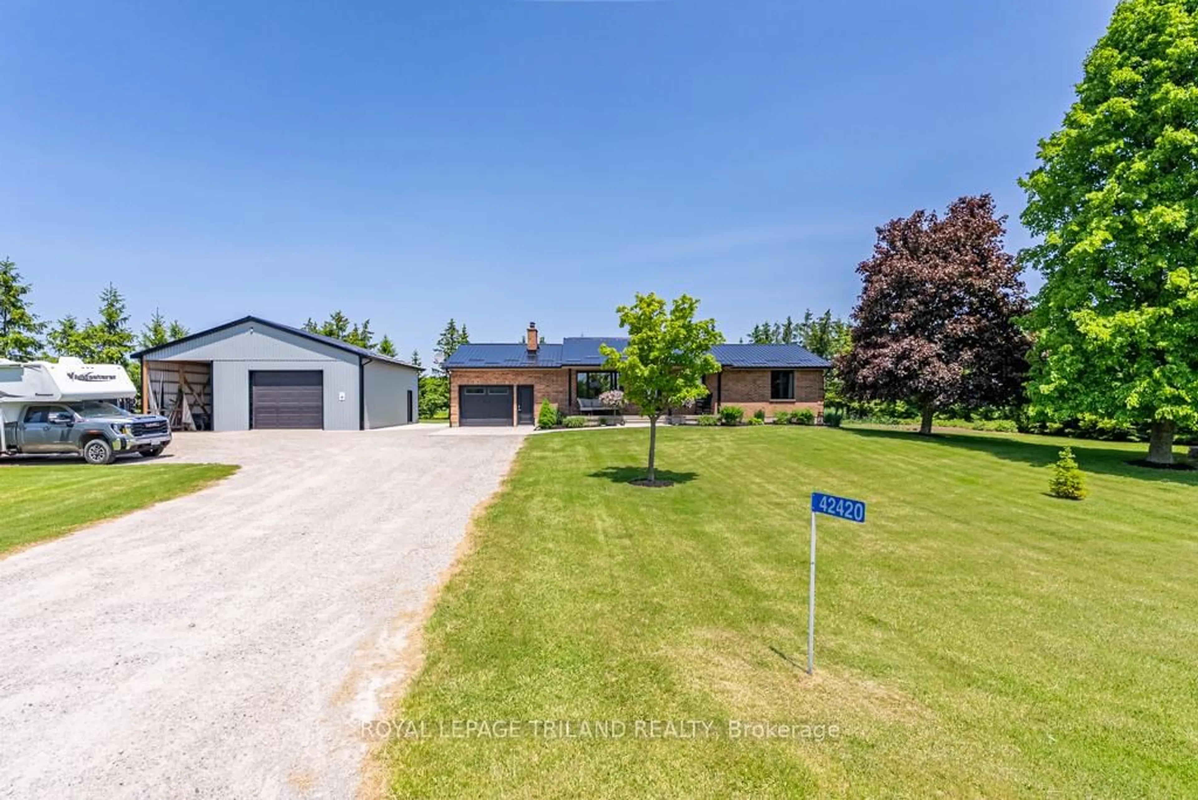 A pic from outside/outdoor area/front of a property/back of a property/a pic from drone, unknown for 42420 Ron McNeil Line, Central Elgin Ontario N5P 3T1