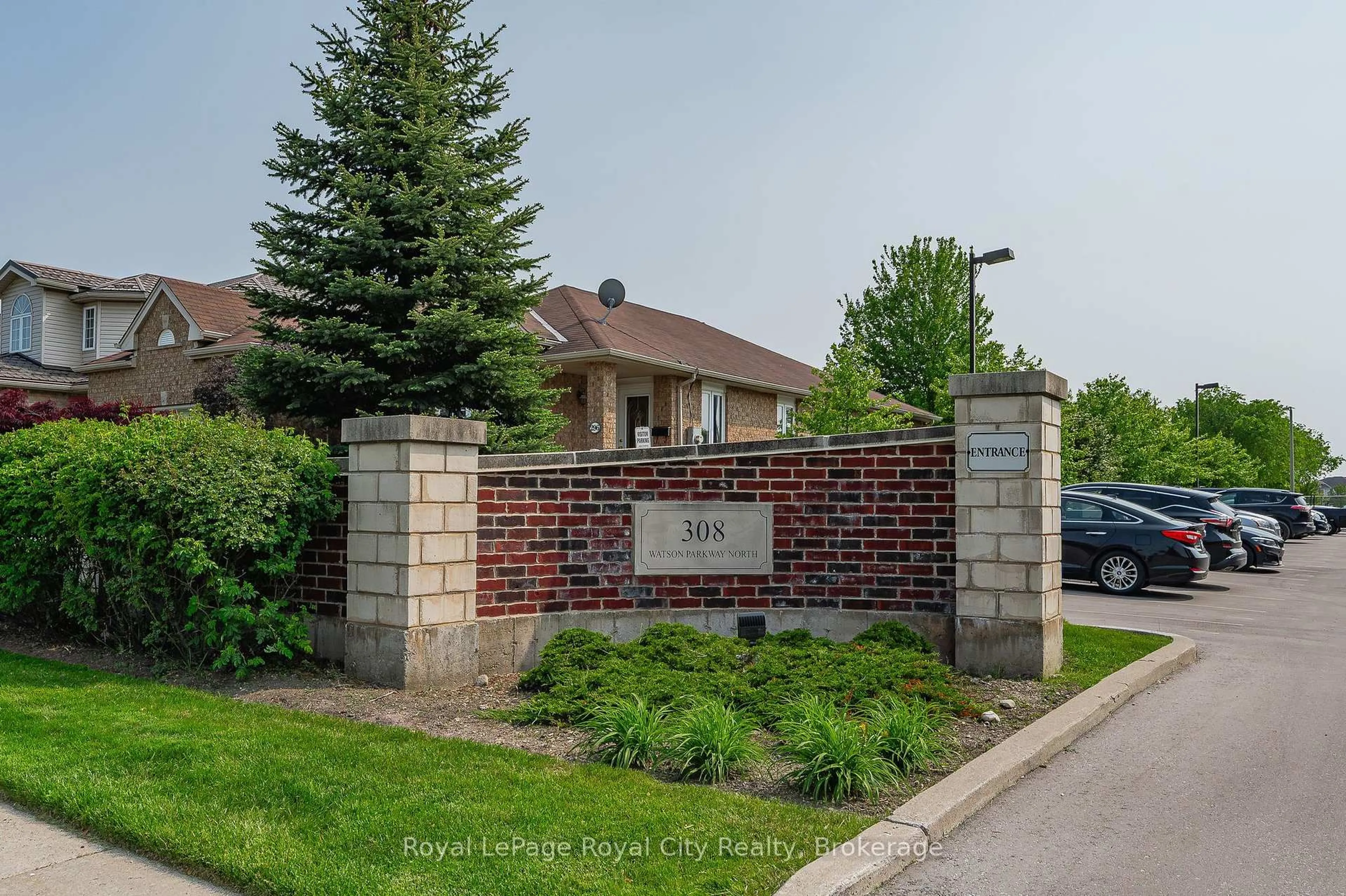 Home with brick exterior material, street for 308 Watson Pkwy #408, Guelph Ontario N1E 0G7