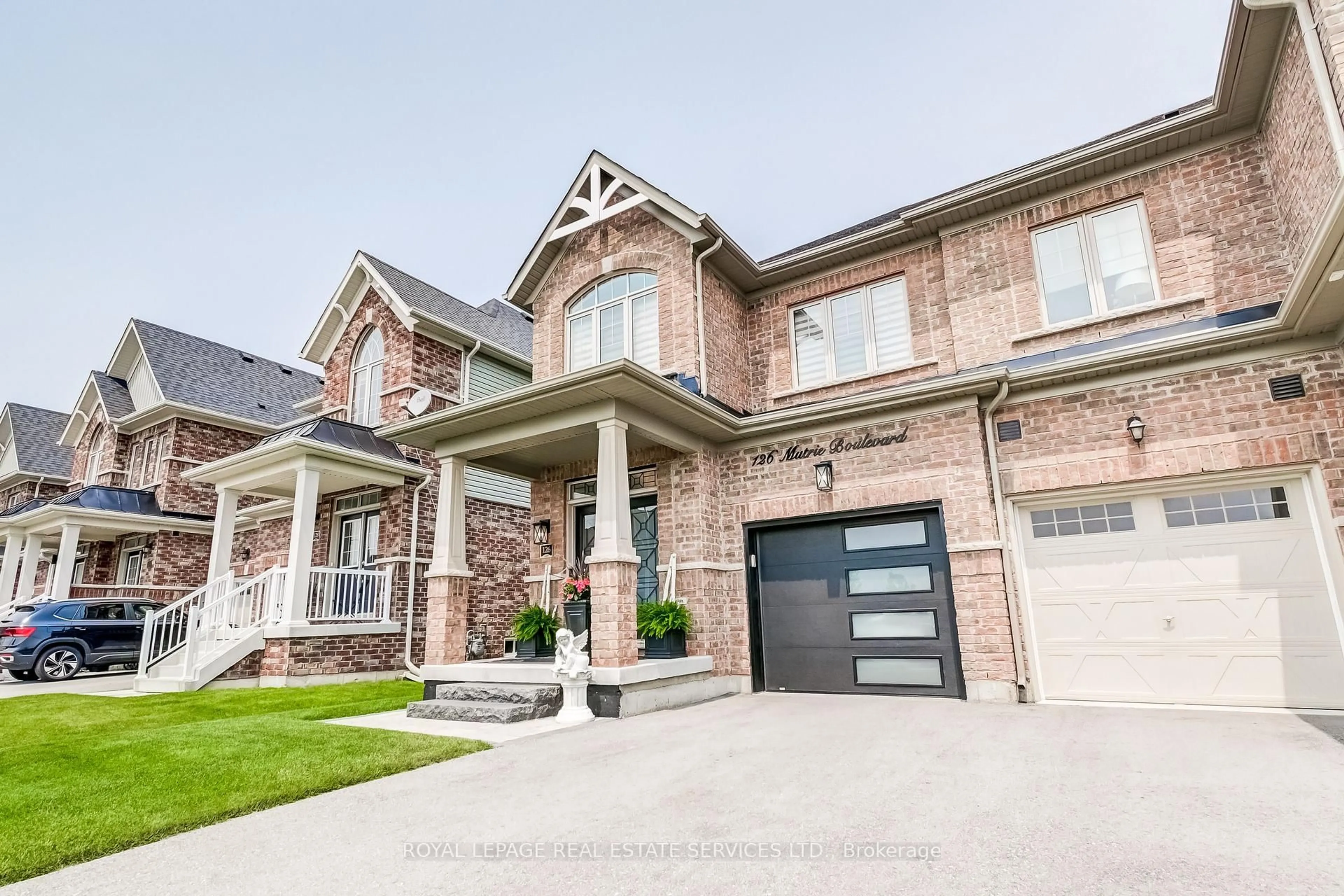 Home with brick exterior material, street for 126 Mutrie Blvd, Guelph/Eramosa Ontario N0B 2K0