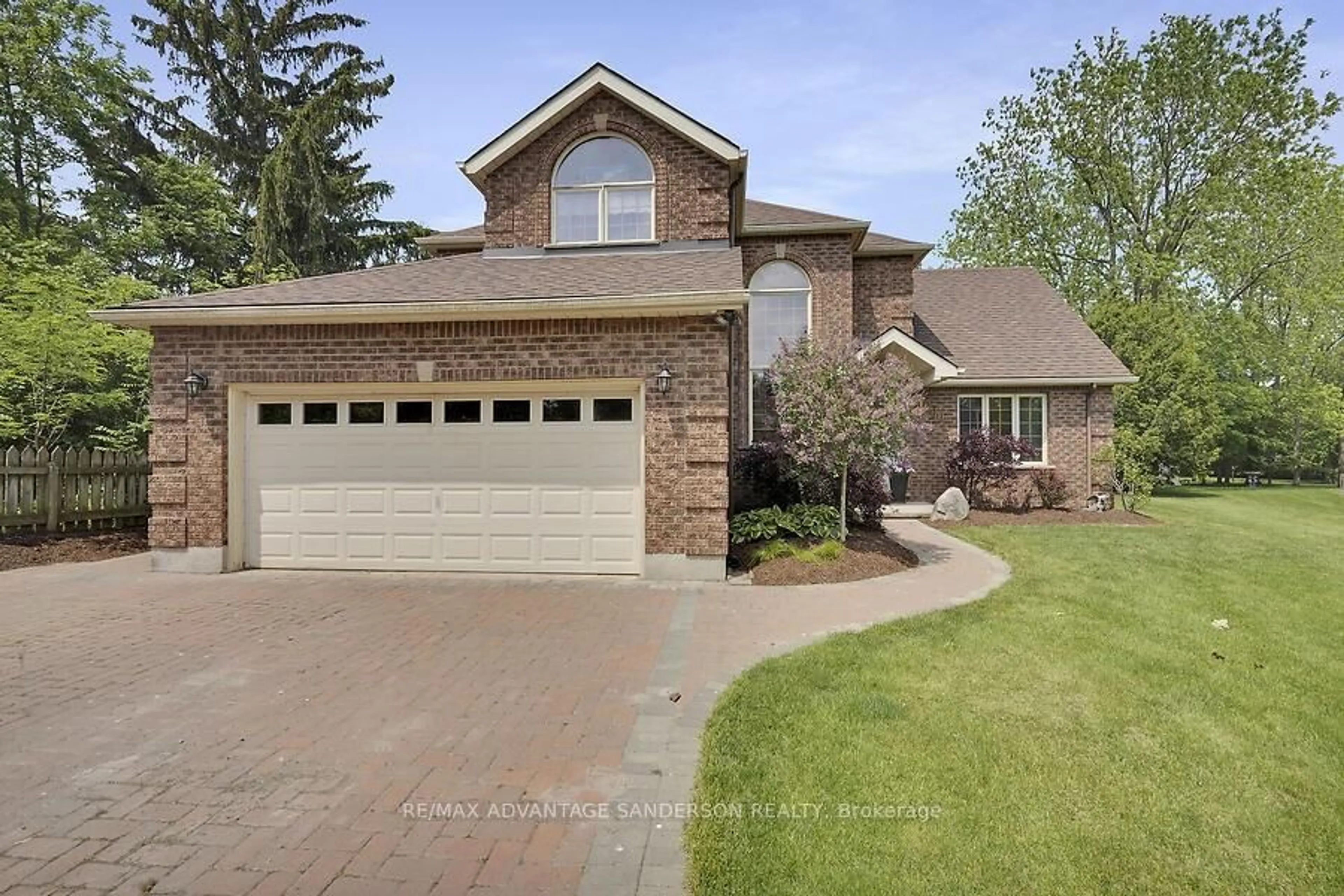 Home with brick exterior material, street for 1400 Rabbitwood Crt, North Middlesex Ontario N0M 1A0