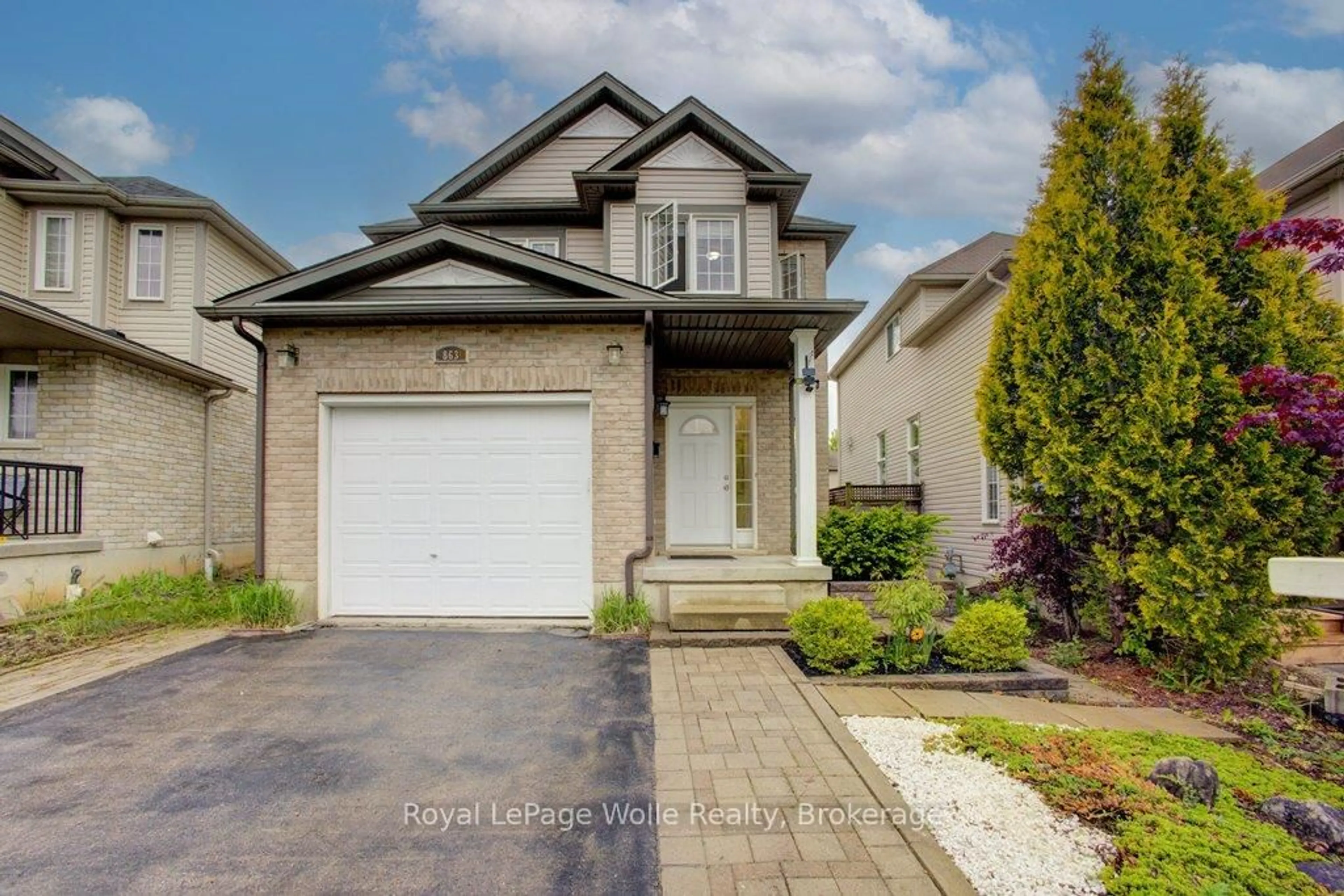 Home with brick exterior material, street for 863 Laurelwood Dr, Waterloo Ontario N2V 2X8