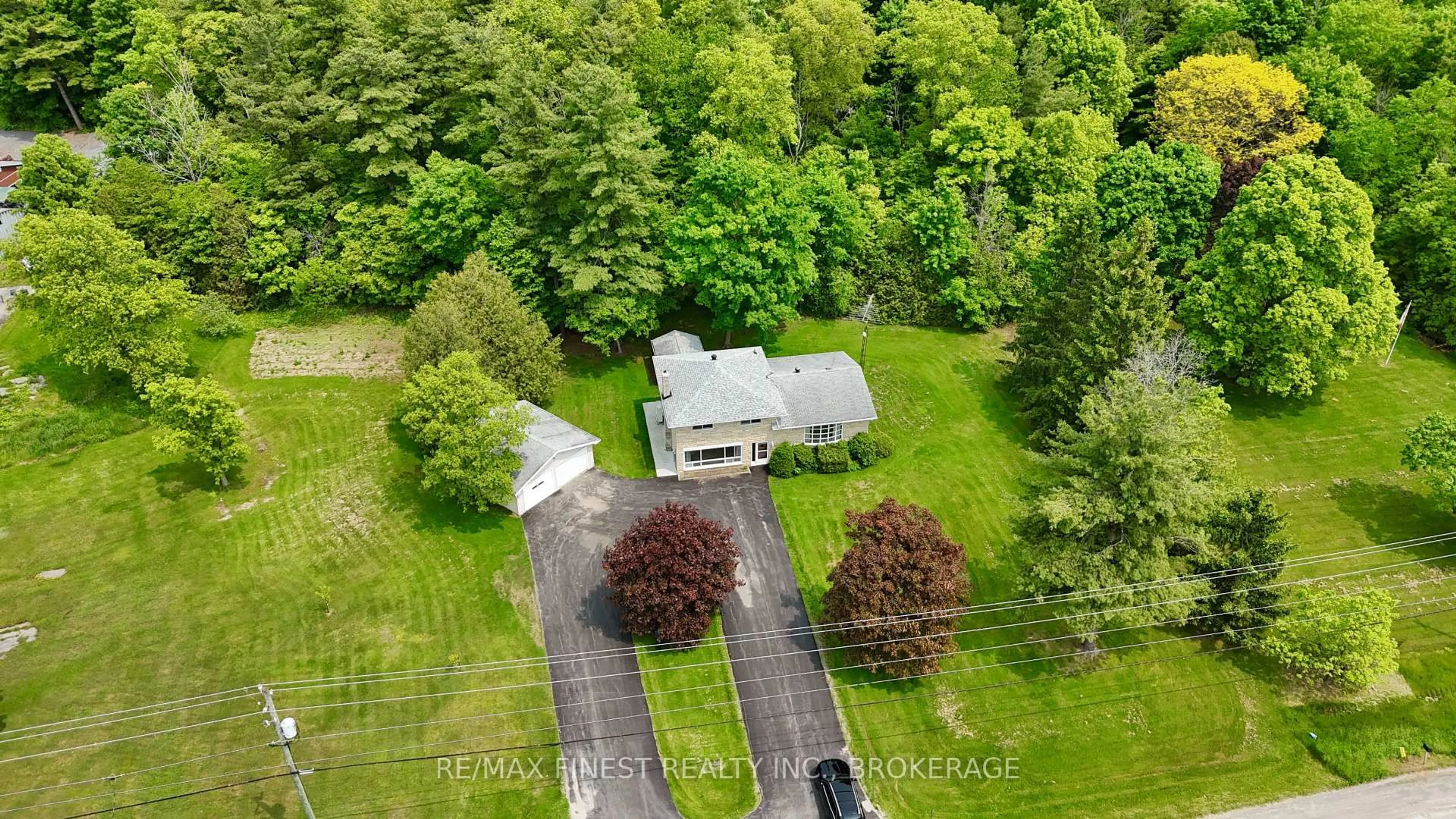 A pic from outside/outdoor area/front of a property/back of a property/a pic from drone, unknown for 3136 Highway 38, Mcdonalds Corners Ontario K0H 1M0