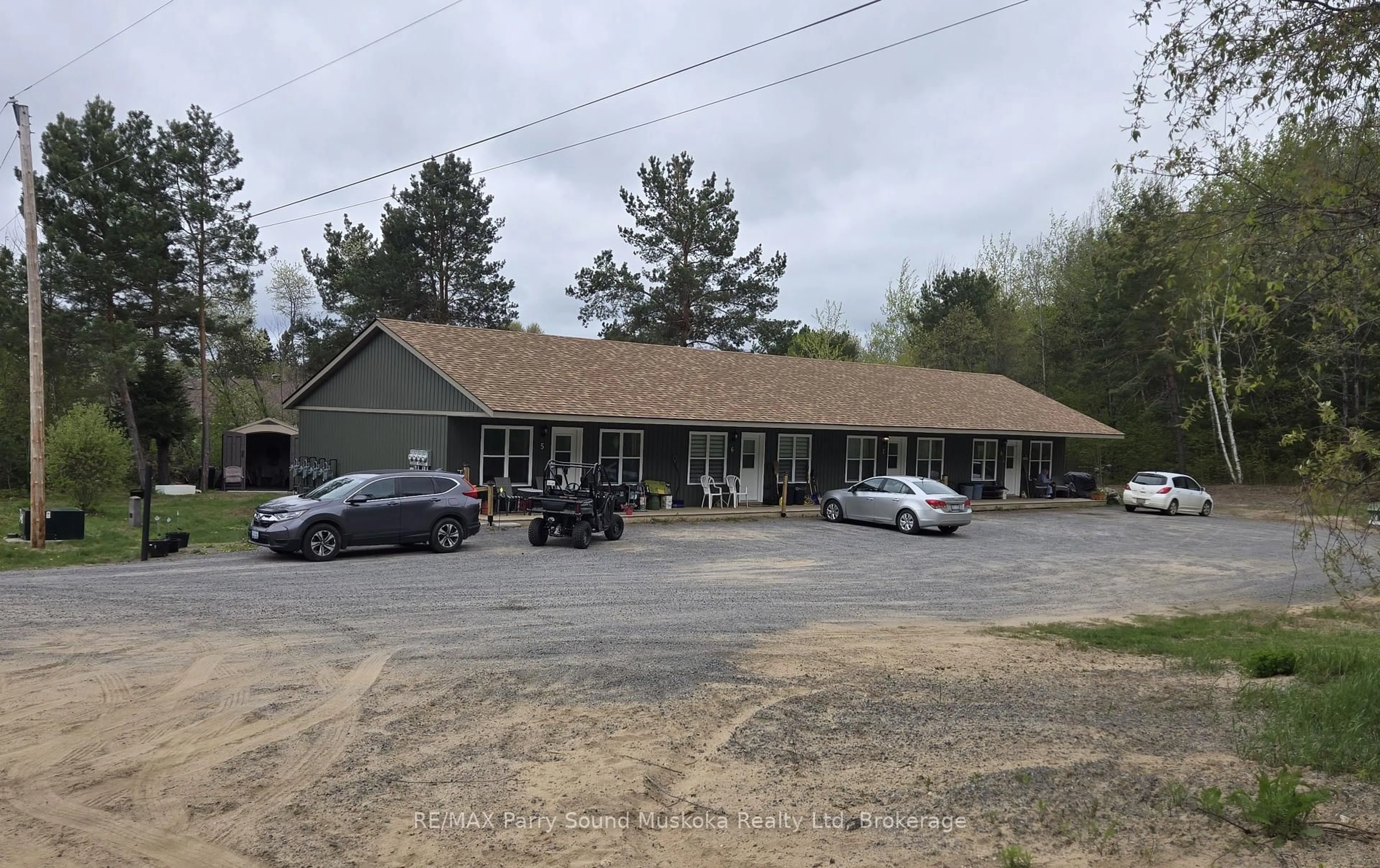 A pic from outside/outdoor area/front of a property/back of a property/a pic from drone, building for 18 Roselawn Blvd, South River Ontario P0A 1M0
