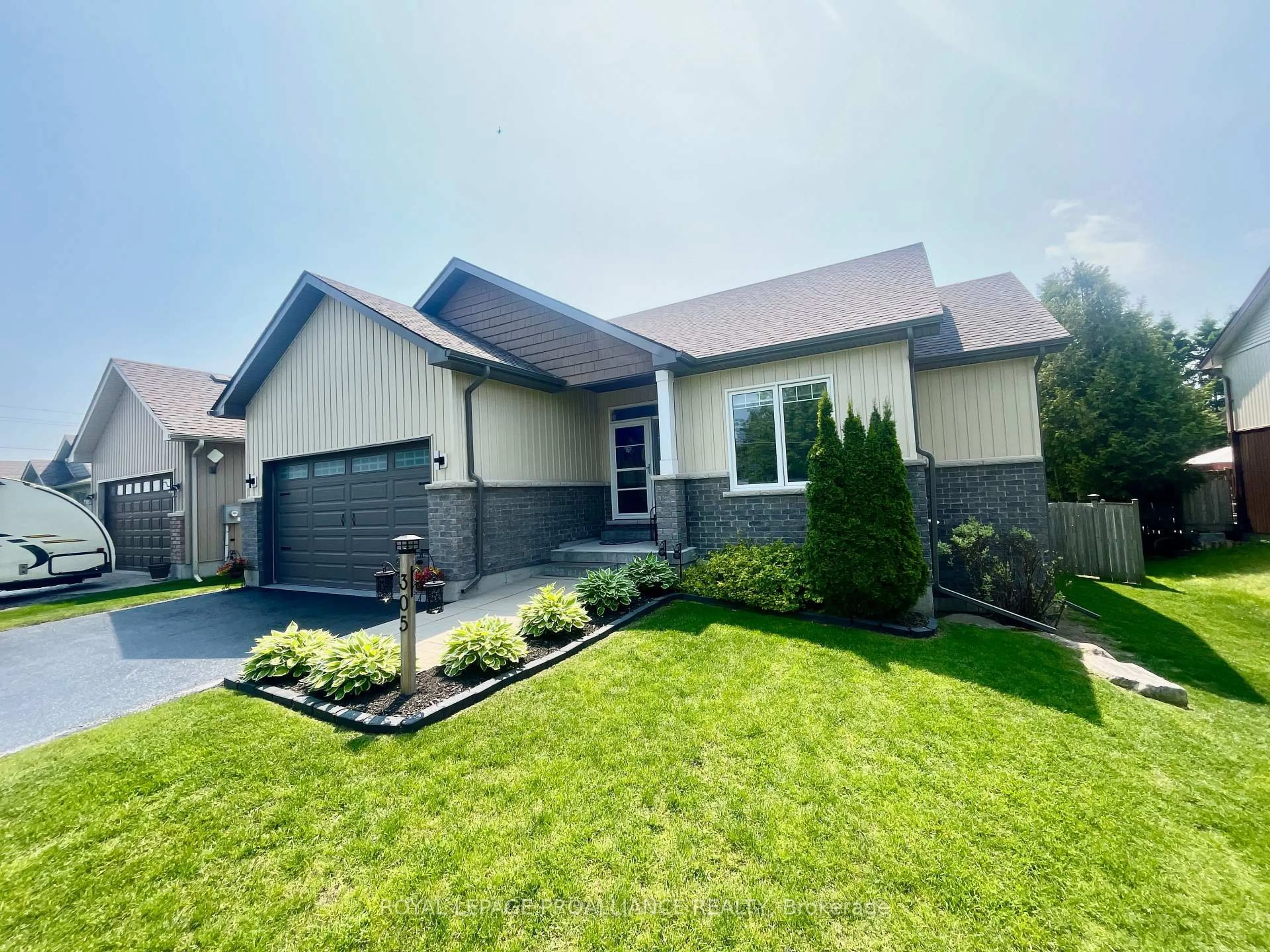 Home with vinyl exterior material, street for 305 Raglan St, Brighton Ontario K0K 1H0