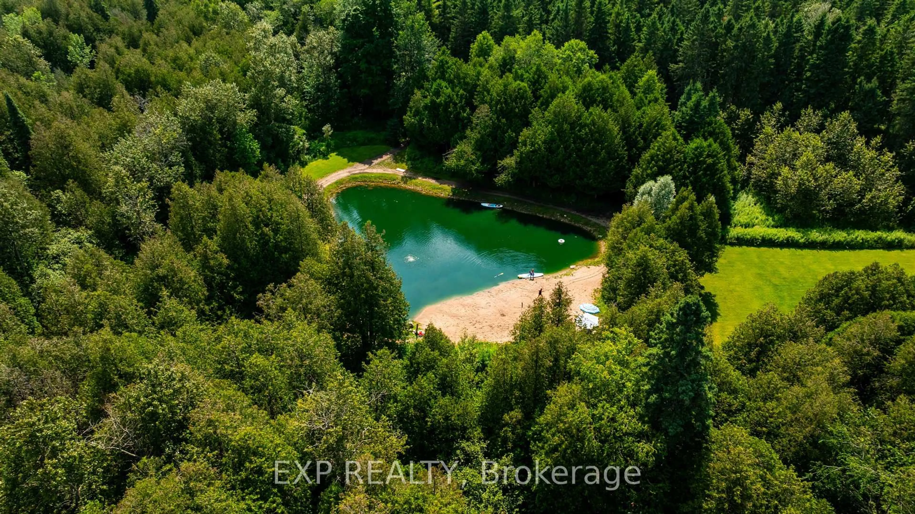 A pic from outside/outdoor area/front of a property/back of a property/a pic from drone, water/lake/river/ocean view for 506097 Highway 89, Mulmur Ontario L9V 0N6