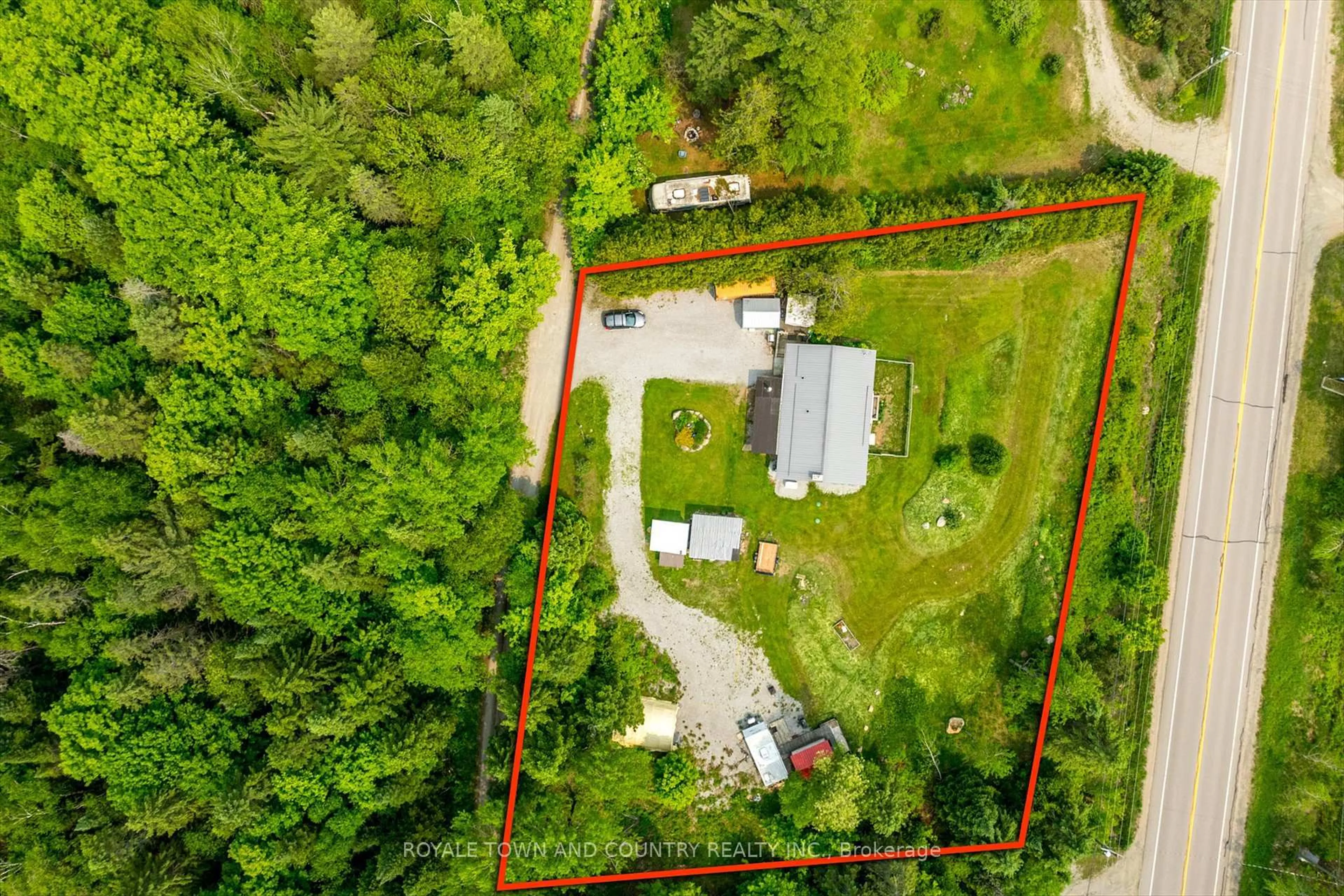 A pic from outside/outdoor area/front of a property/back of a property/a pic from drone, unknown for 1042 Tweed Dr, Highlands East Ontario K0M 1R0