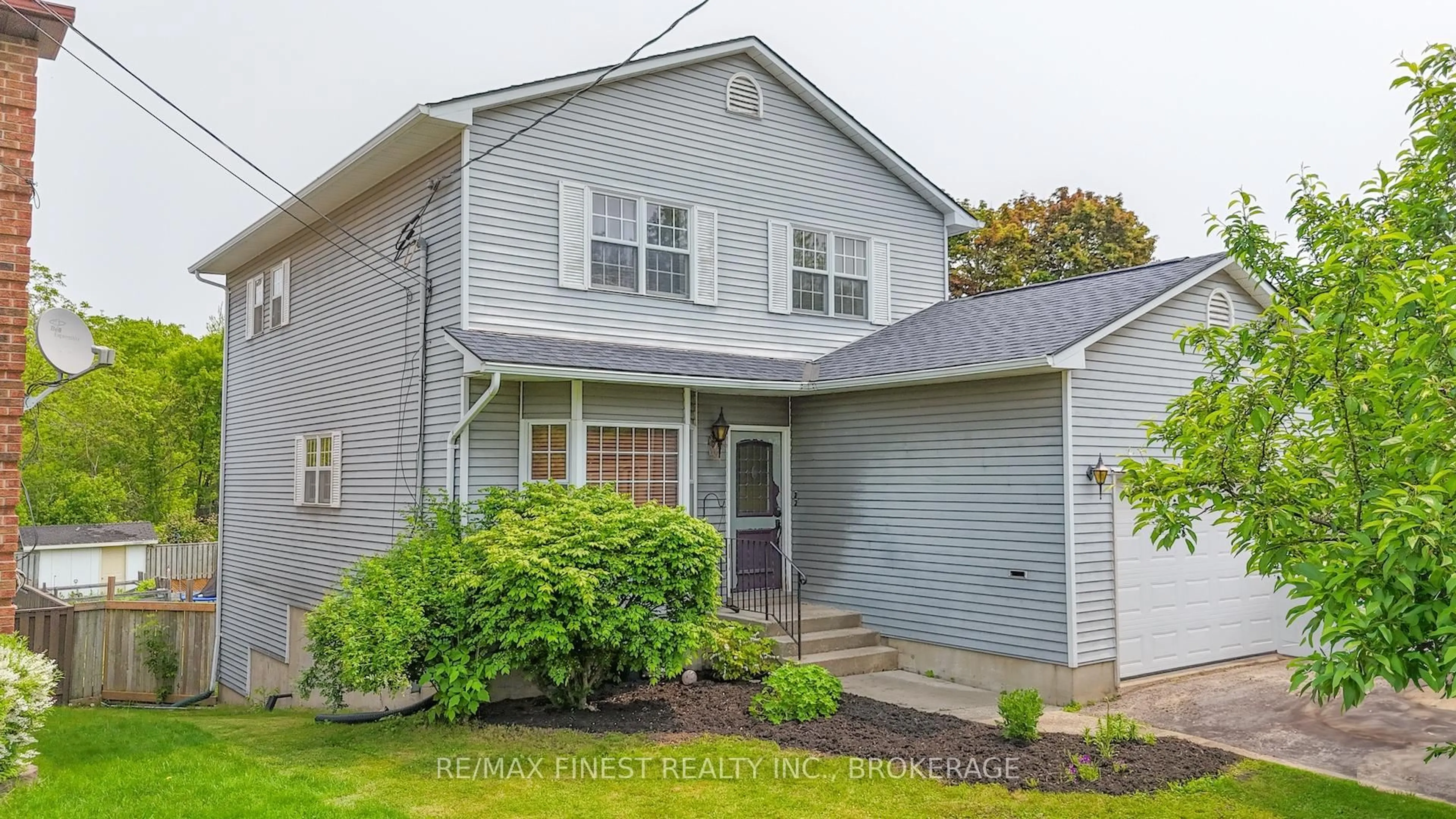 Home with vinyl exterior material, street for 465 William St, Gananoque Ontario K7G 3A8