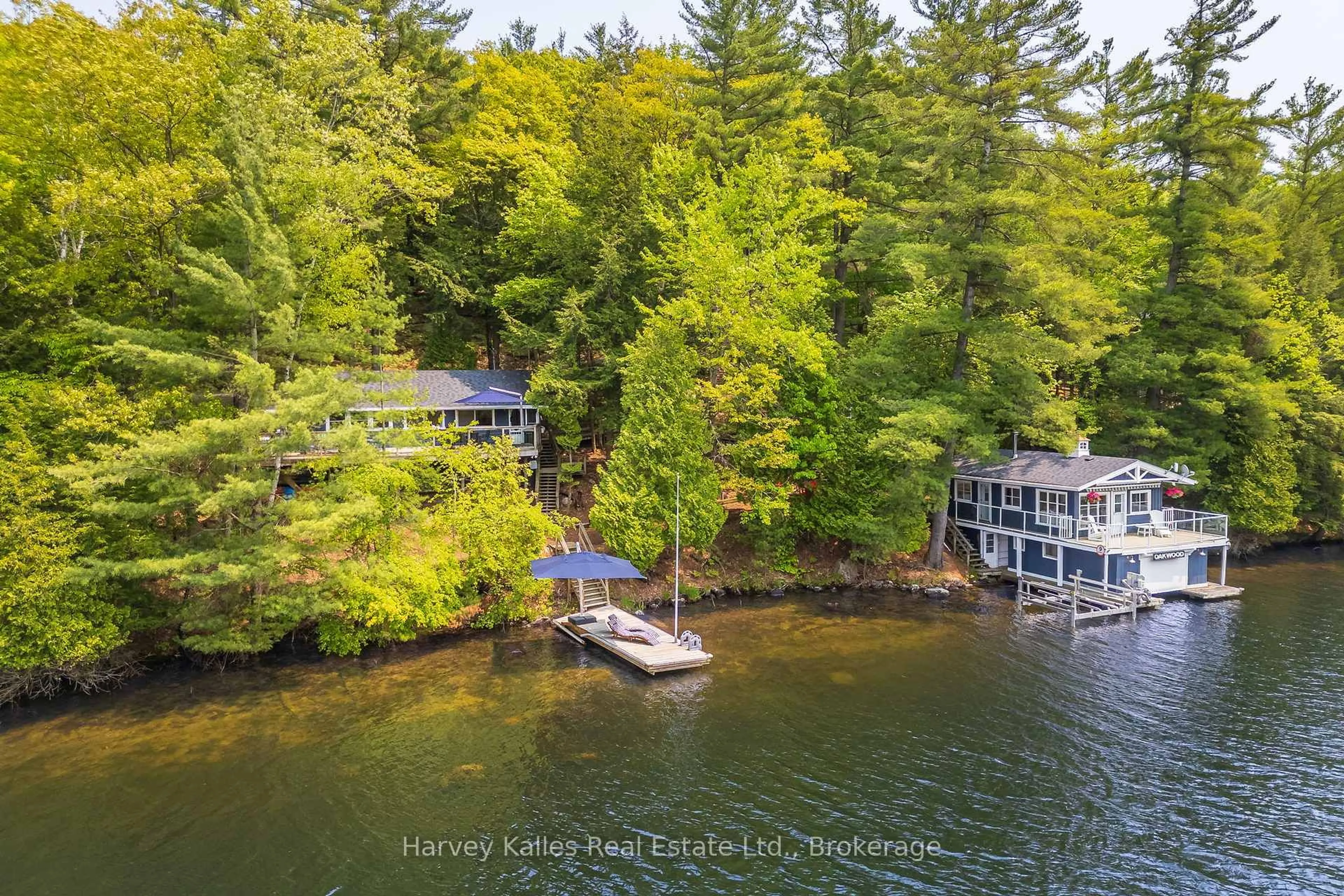 A pic from outside/outdoor area/front of a property/back of a property/a pic from drone, water/lake/river/ocean view for 1062 Pennwood Rd #3, Muskoka Lakes Ontario P0B 1J0
