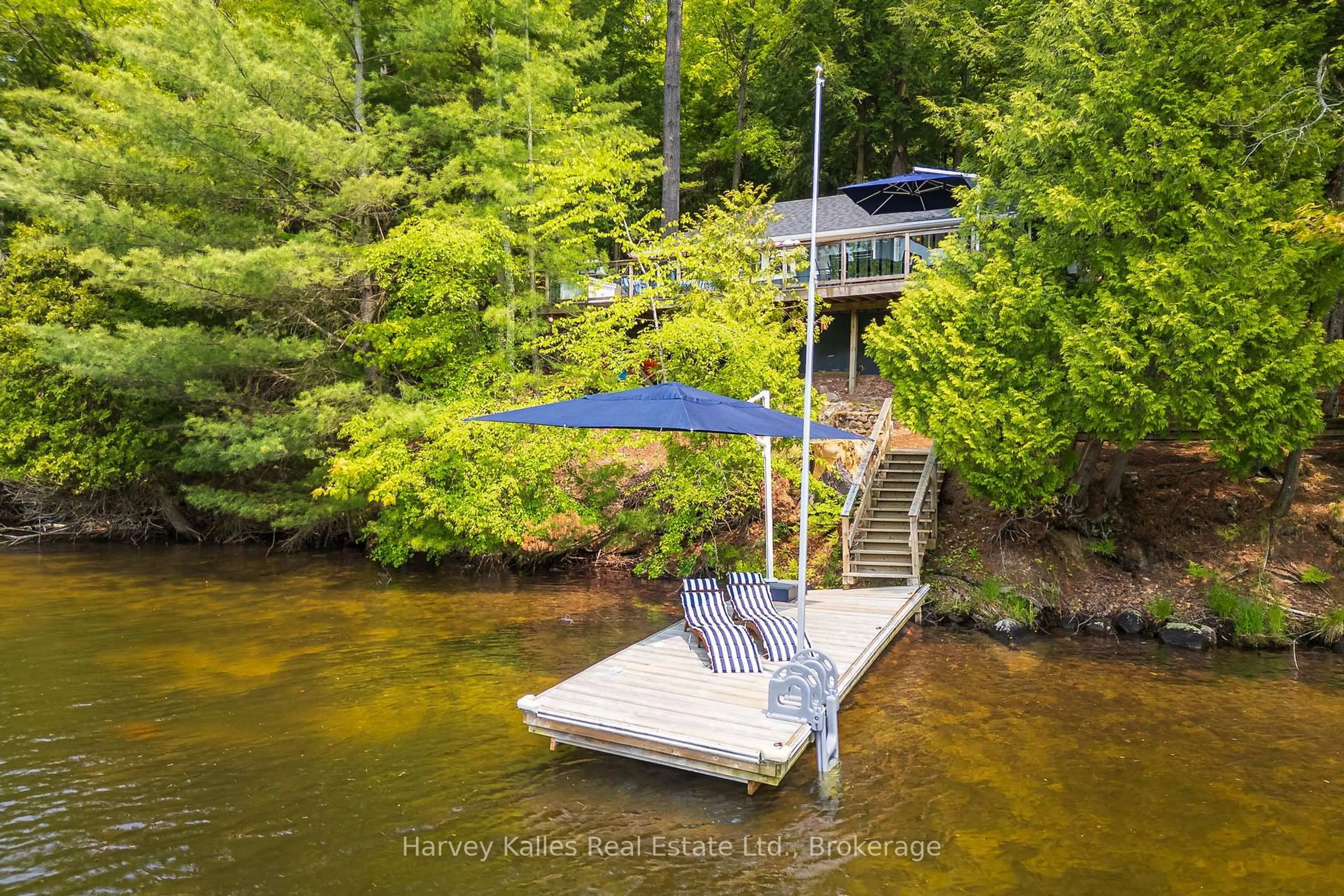 A pic from outside/outdoor area/front of a property/back of a property/a pic from drone, water/lake/river/ocean view for 1062 Pennwood Rd #3, Muskoka Lakes Ontario P0B 1J0