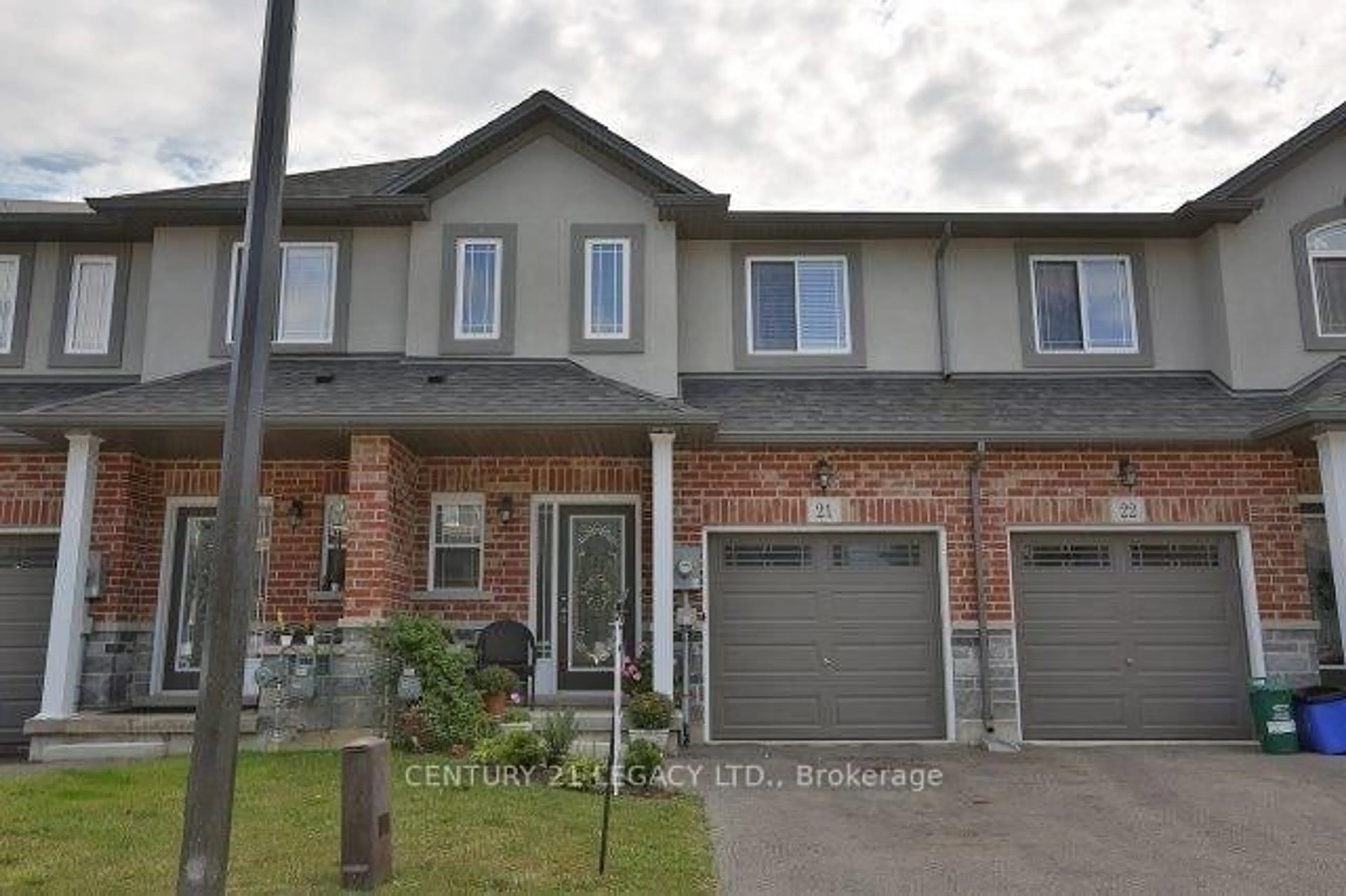 Home with brick exterior material, street for 345 Glancaster Rd #21, Hamilton Ontario L9G 3K9