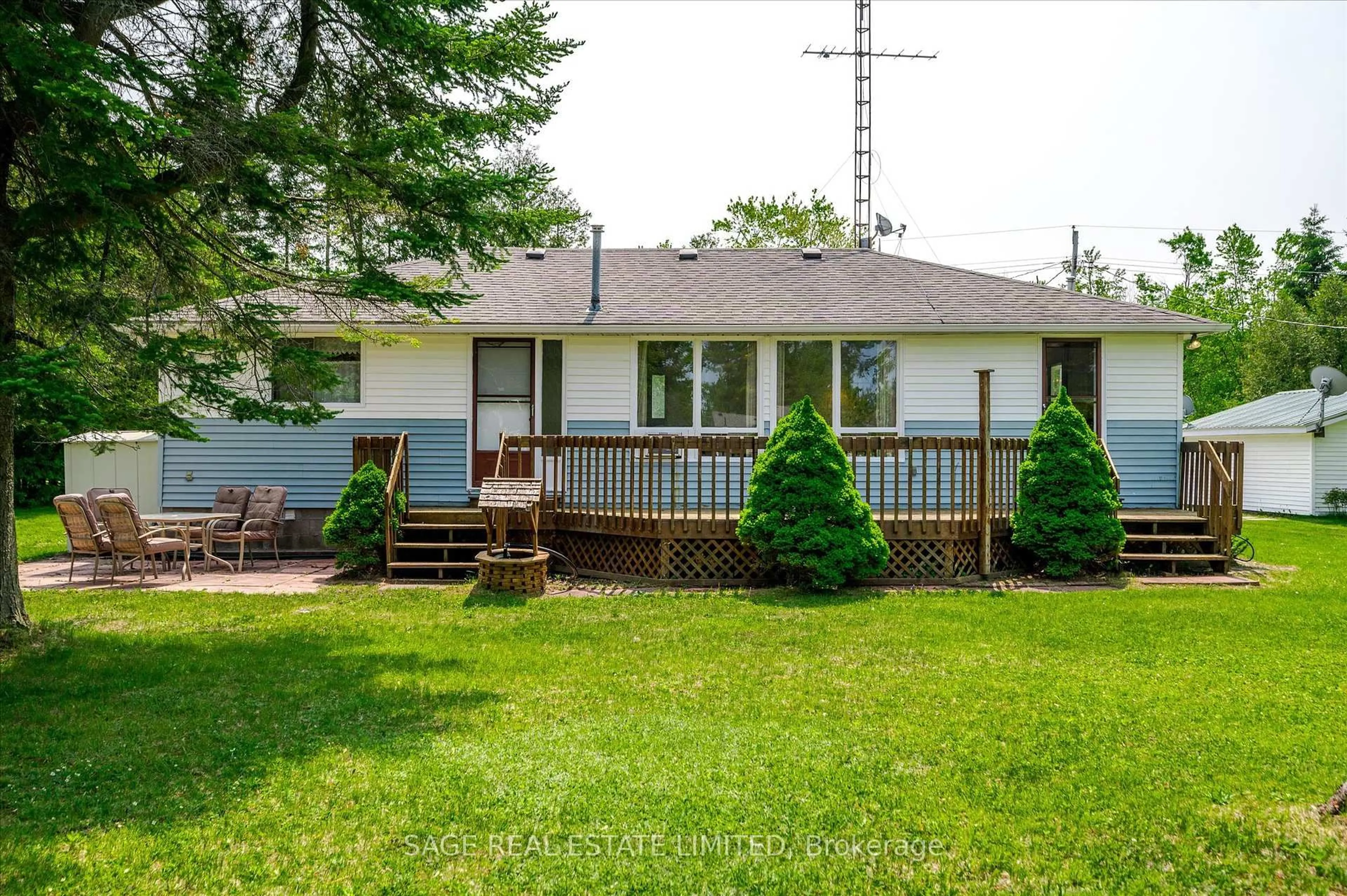 Home with vinyl exterior material, street for 33 Fire Route 104, Trent Lakes Ontario K0M 1A0