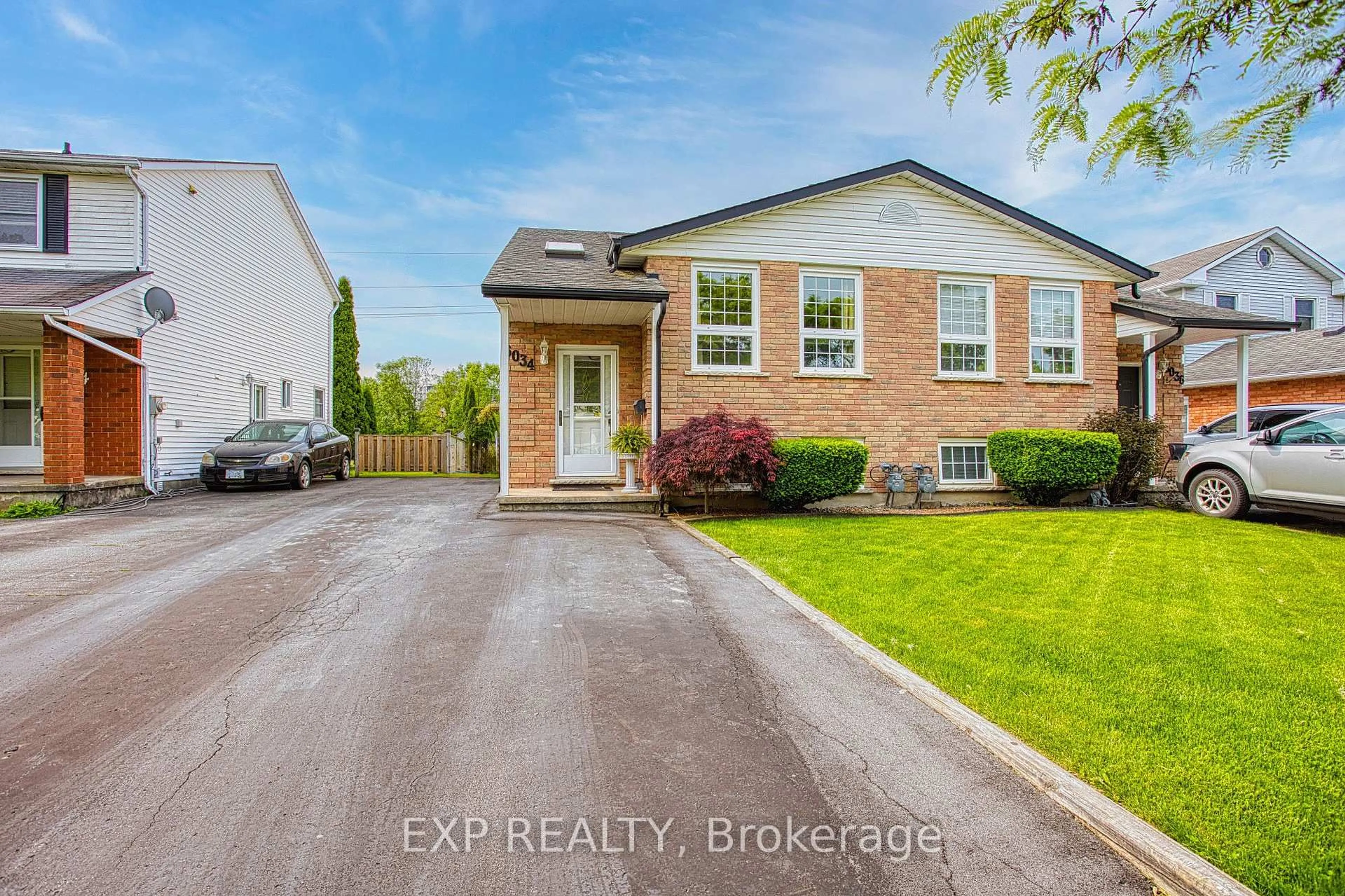 Home with brick exterior material, street for 6034 Wildrose Cres, Niagara Falls Ontario L2G 7T2