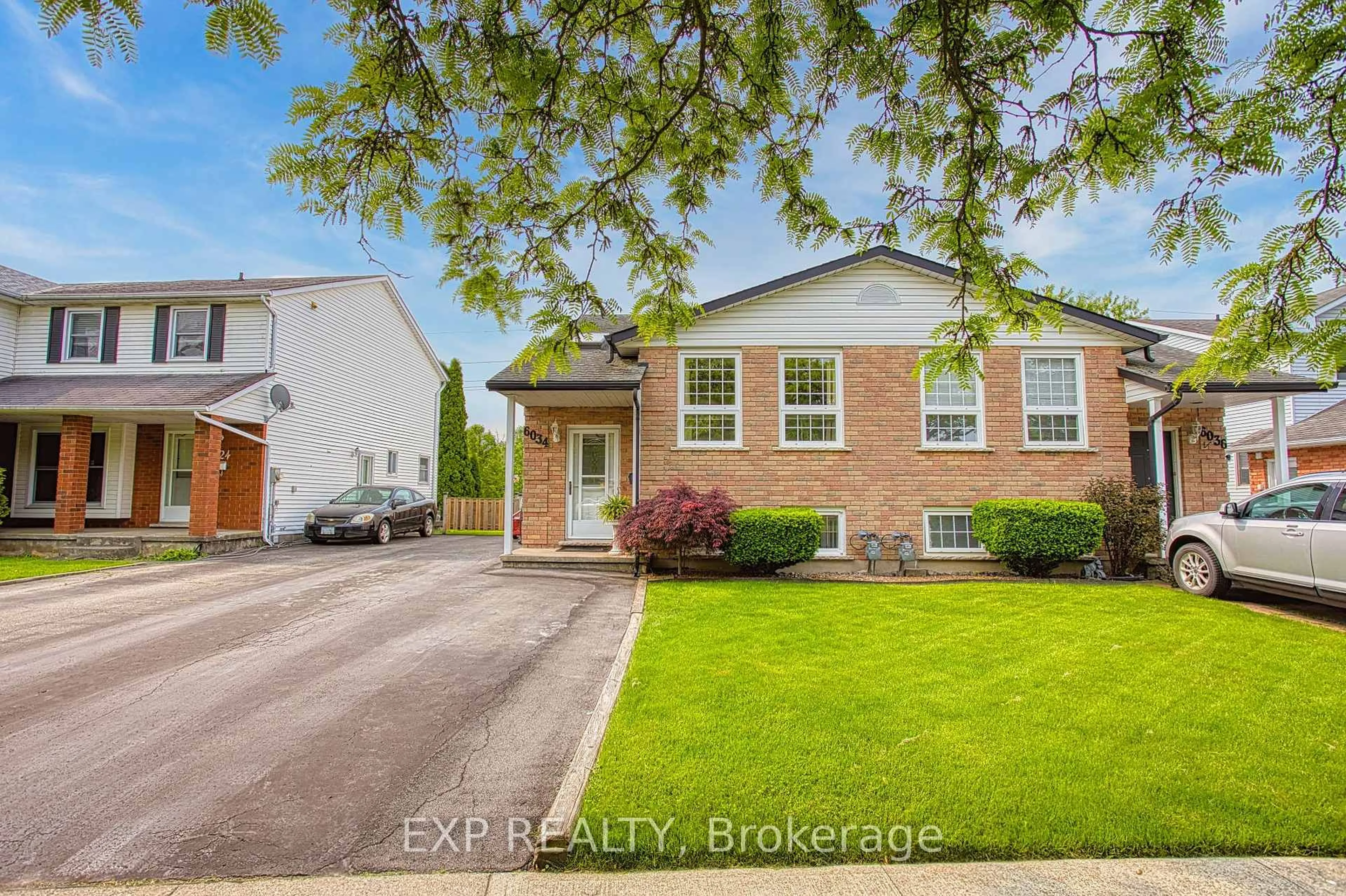 Home with brick exterior material, street for 6034 Wildrose Cres, Niagara Falls Ontario L2G 7T2