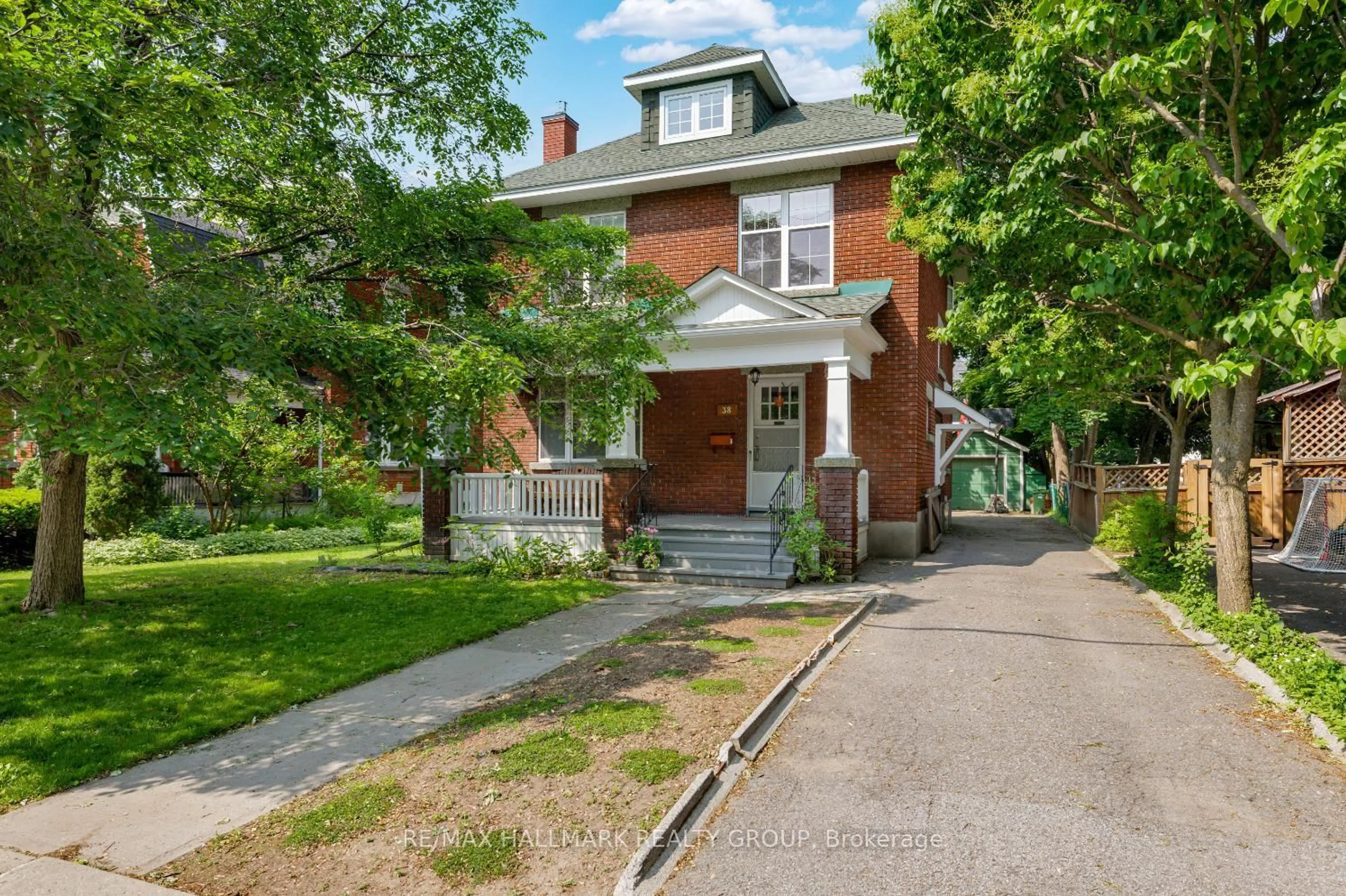 Home with brick exterior material, street for 38 Harmer Ave, Ottawa Ontario K1Y 0T4
