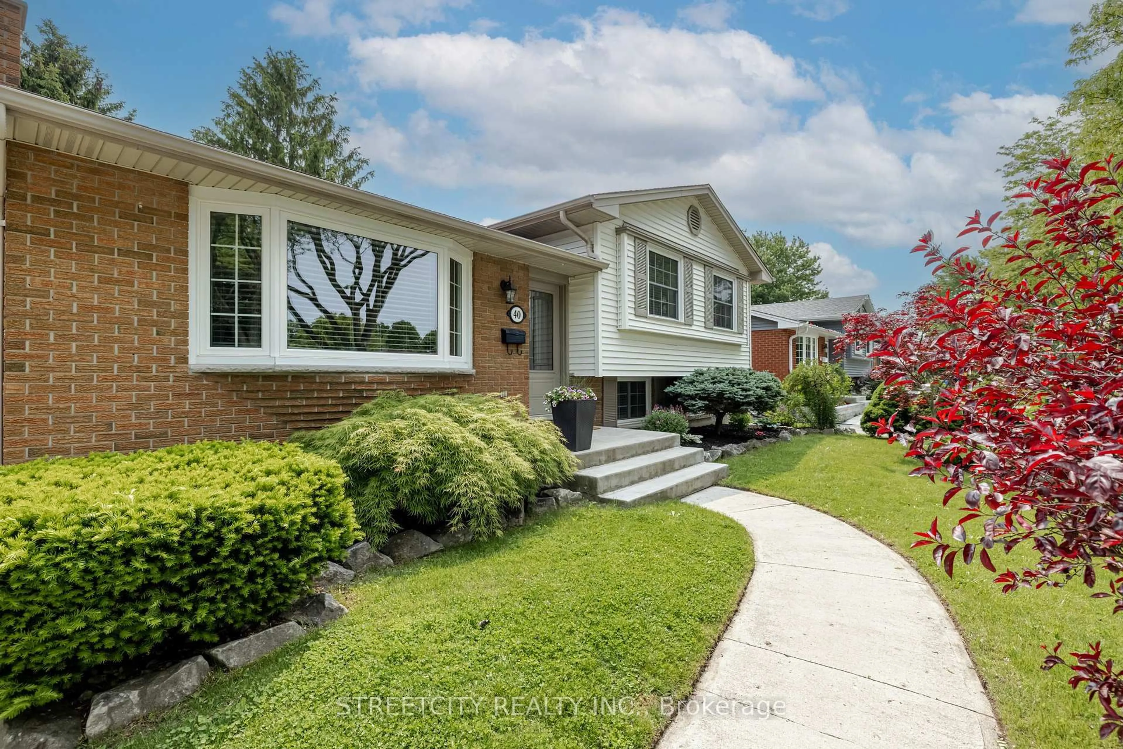 Home with vinyl exterior material, street for 40 St Lawrence Blvd, London South Ontario N6J 2X1
