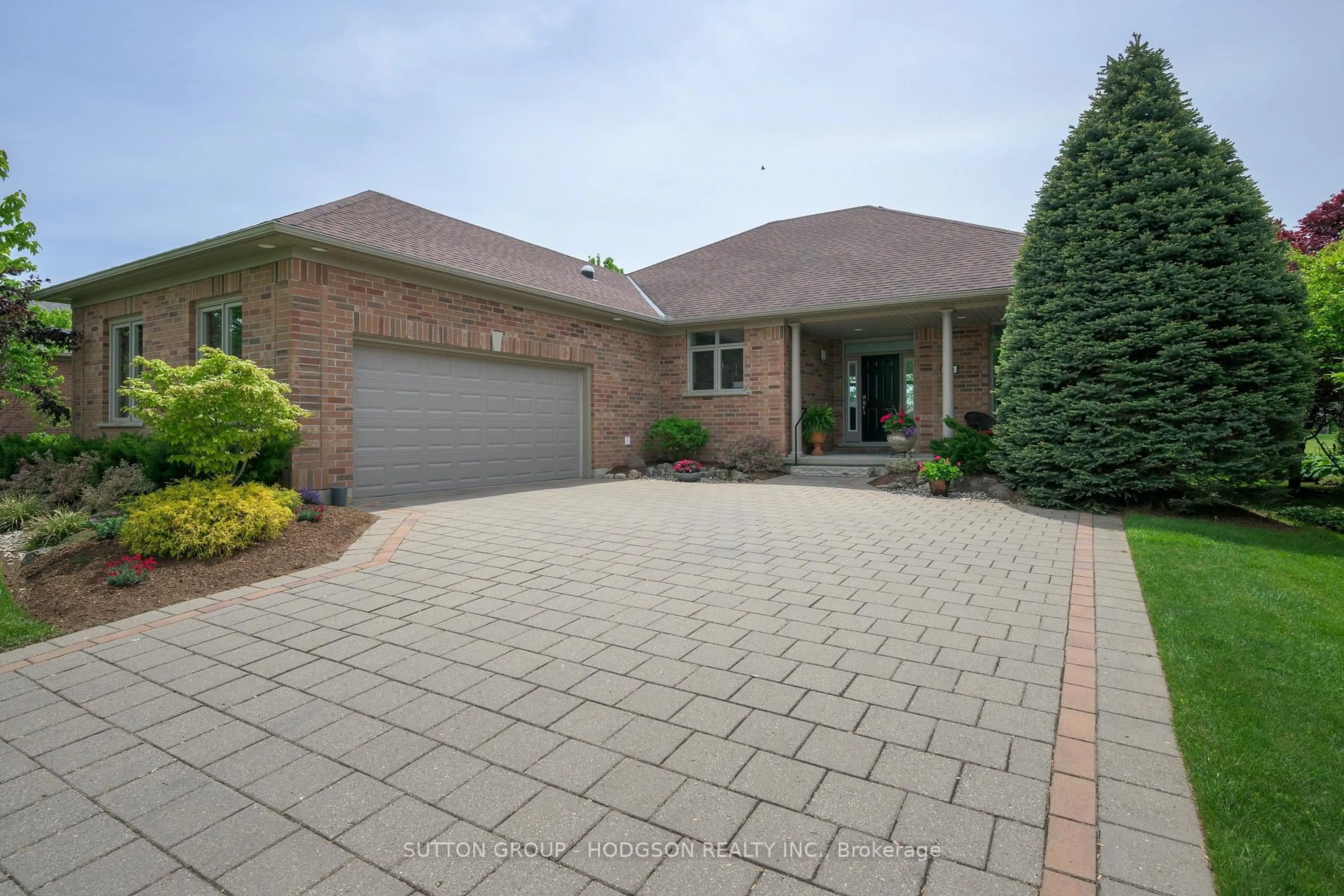 Home with brick exterior material, street for 1024 Sandy Somerville Dr, London South Ontario N6K 5R1