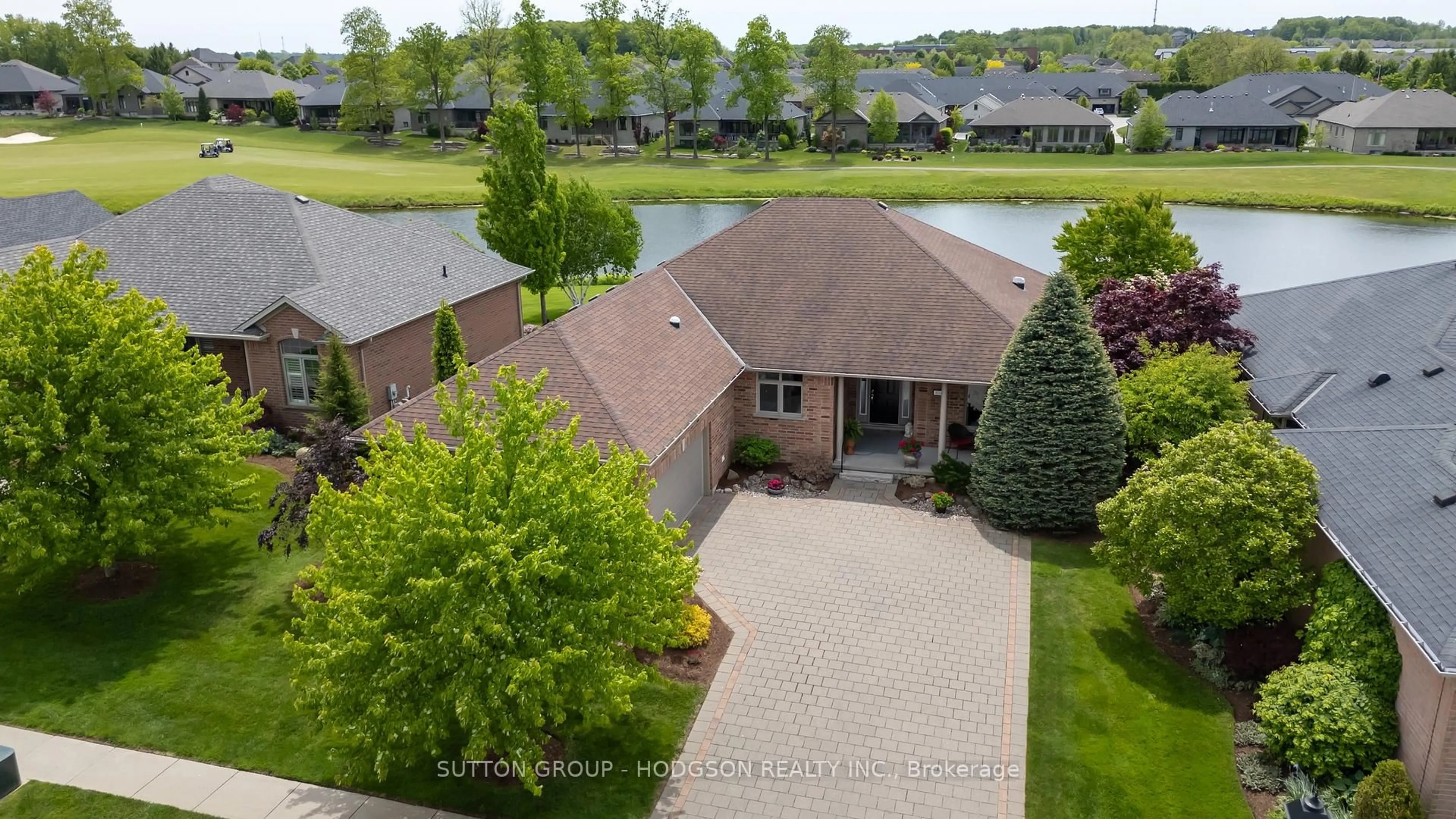 A pic from outside/outdoor area/front of a property/back of a property/a pic from drone, water/lake/river/ocean view for 1024 Sandy Somerville Dr, London South Ontario N6K 5R1