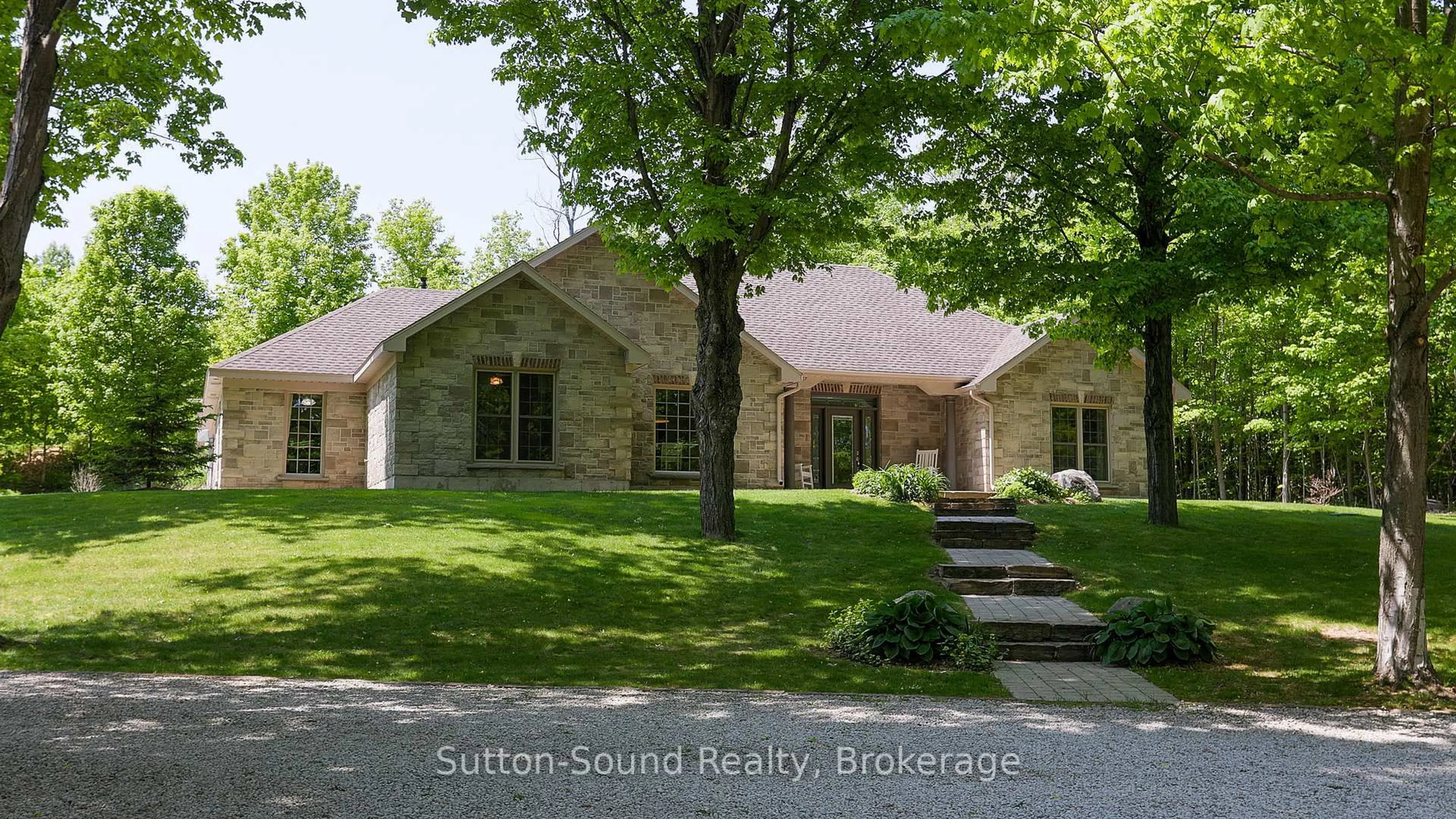 Home with brick exterior material, street for 505556 Grey Road 1 Rd, Georgian Bluffs Ontario N0H 1S0