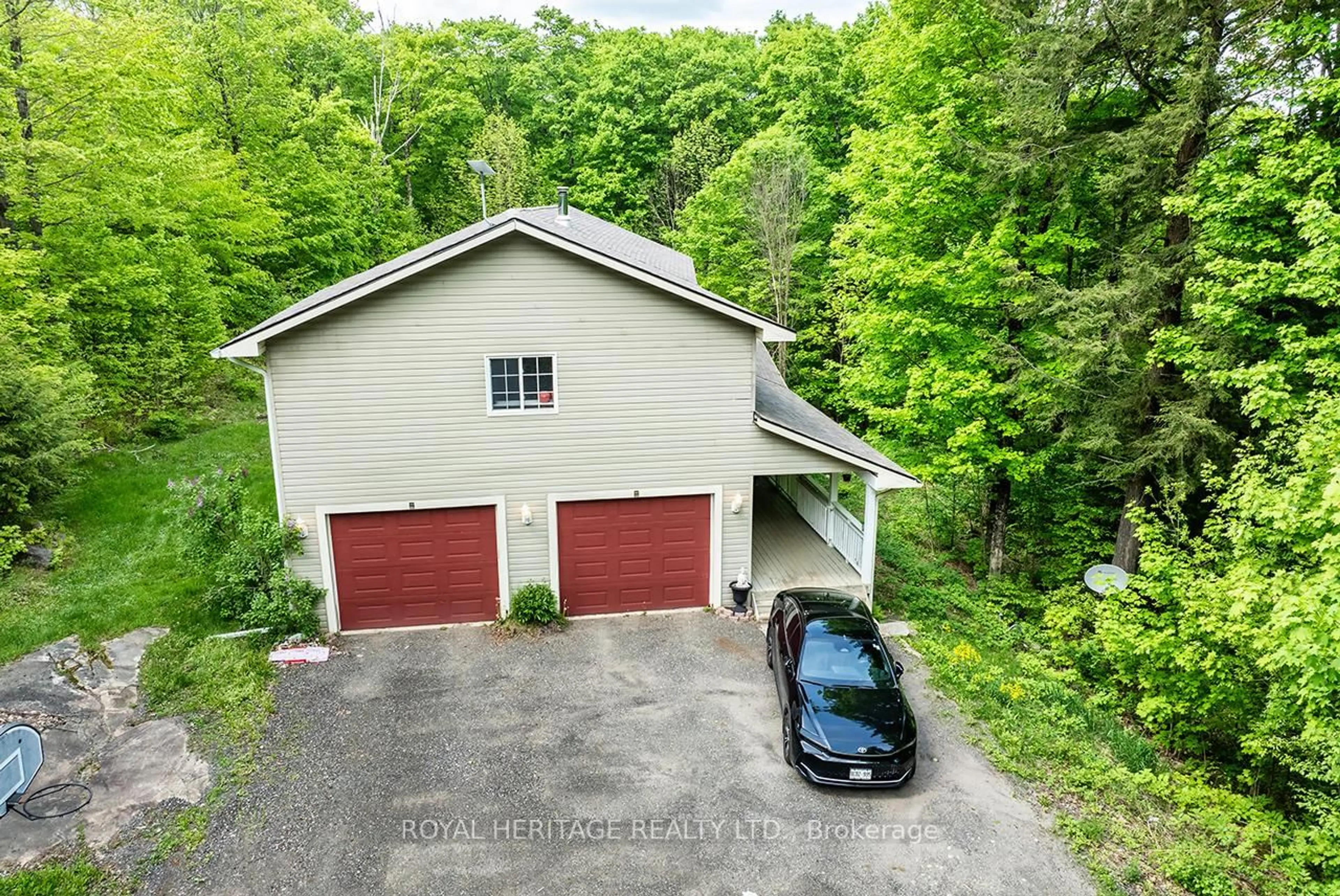 A pic from outside/outdoor area/front of a property/back of a property/a pic from drone, unknown for 1030 Purbrook Rd, Bracebridge Ontario P1L 1X3