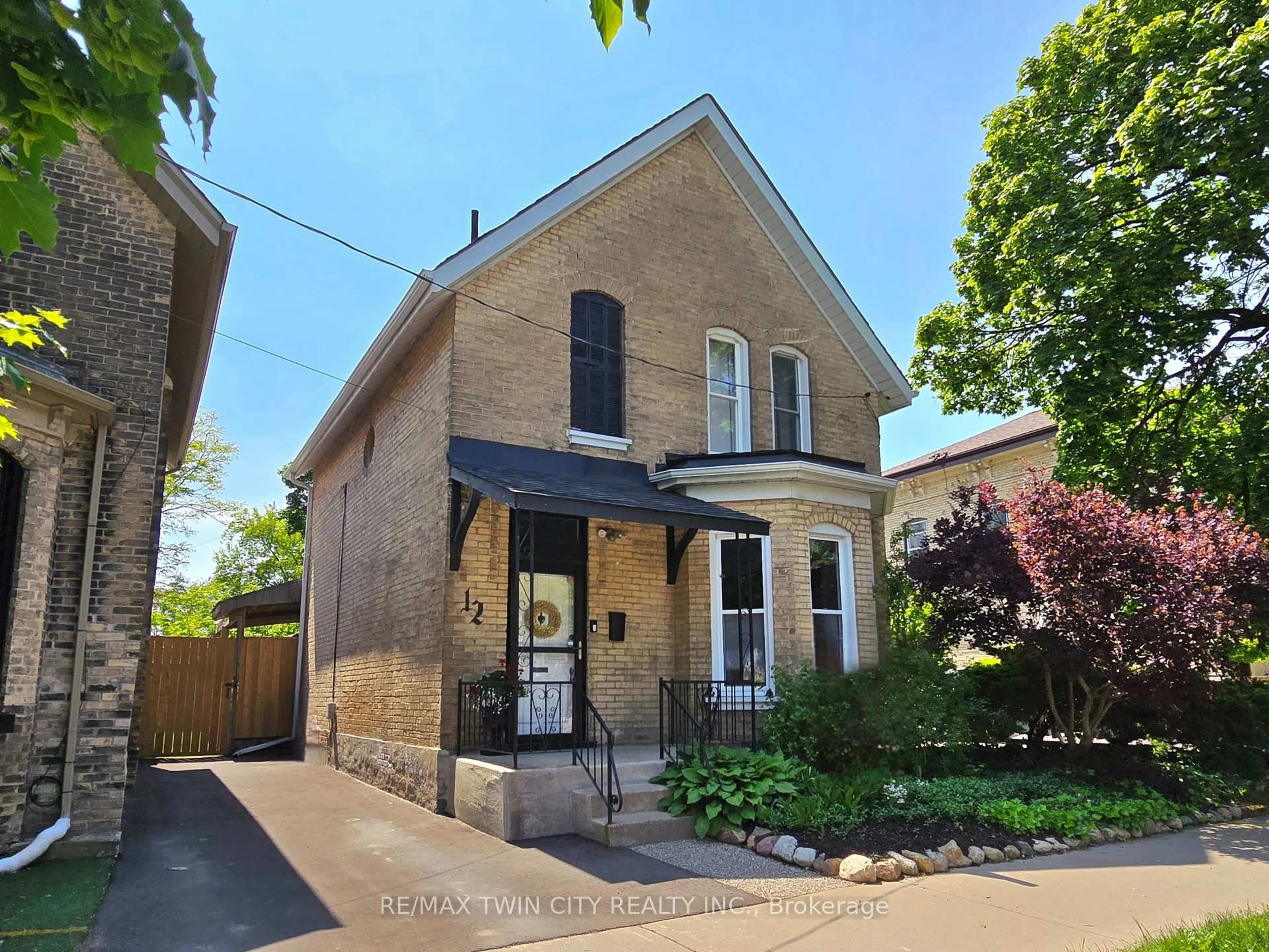 Home with brick exterior material, street for 12 Pearl St, Brantford Ontario N3T 3N4