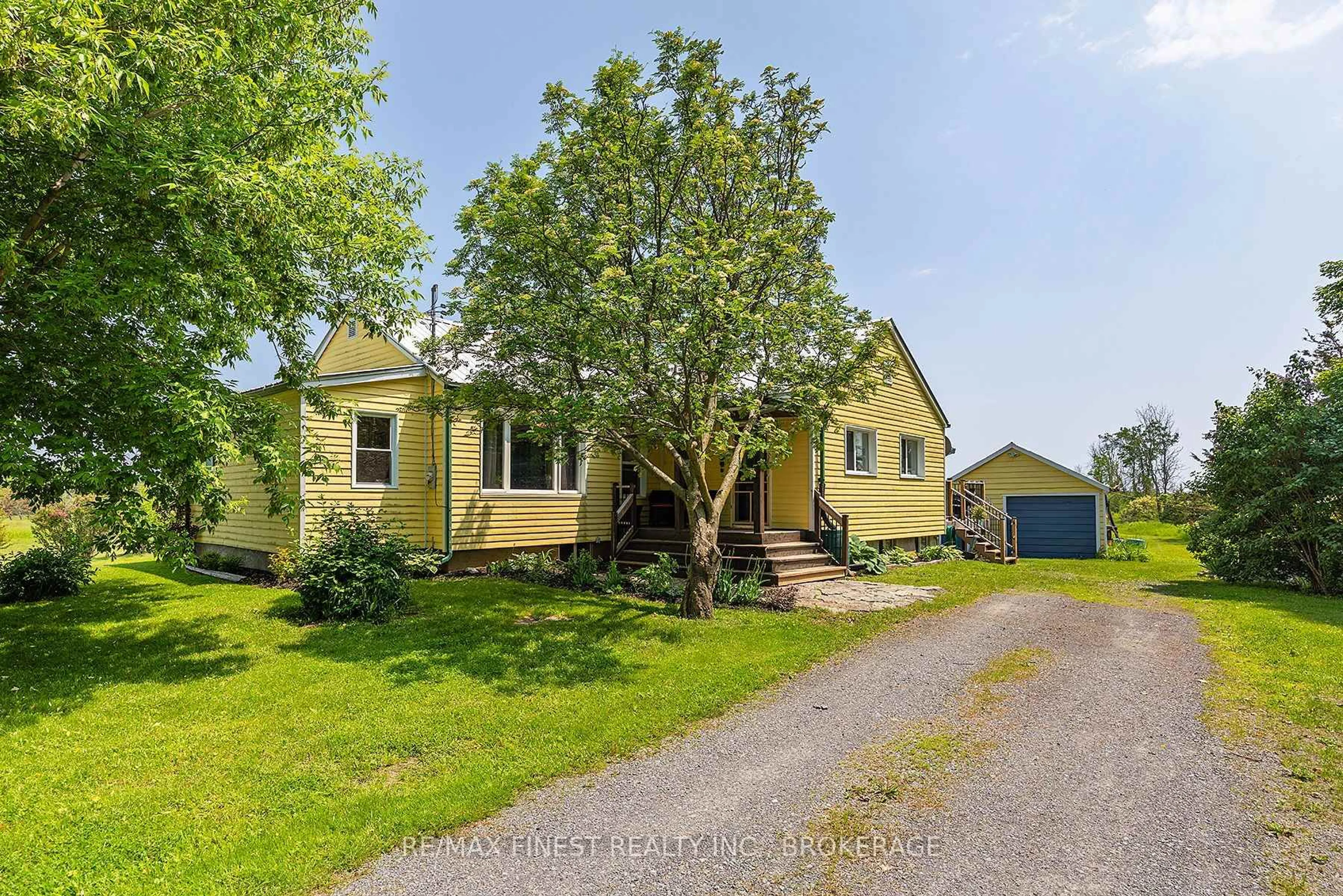A pic from outside/outdoor area/front of a property/back of a property/a pic from drone, street for 5790 County 2 Rd, Bissett Creek Ontario K0H 2H0