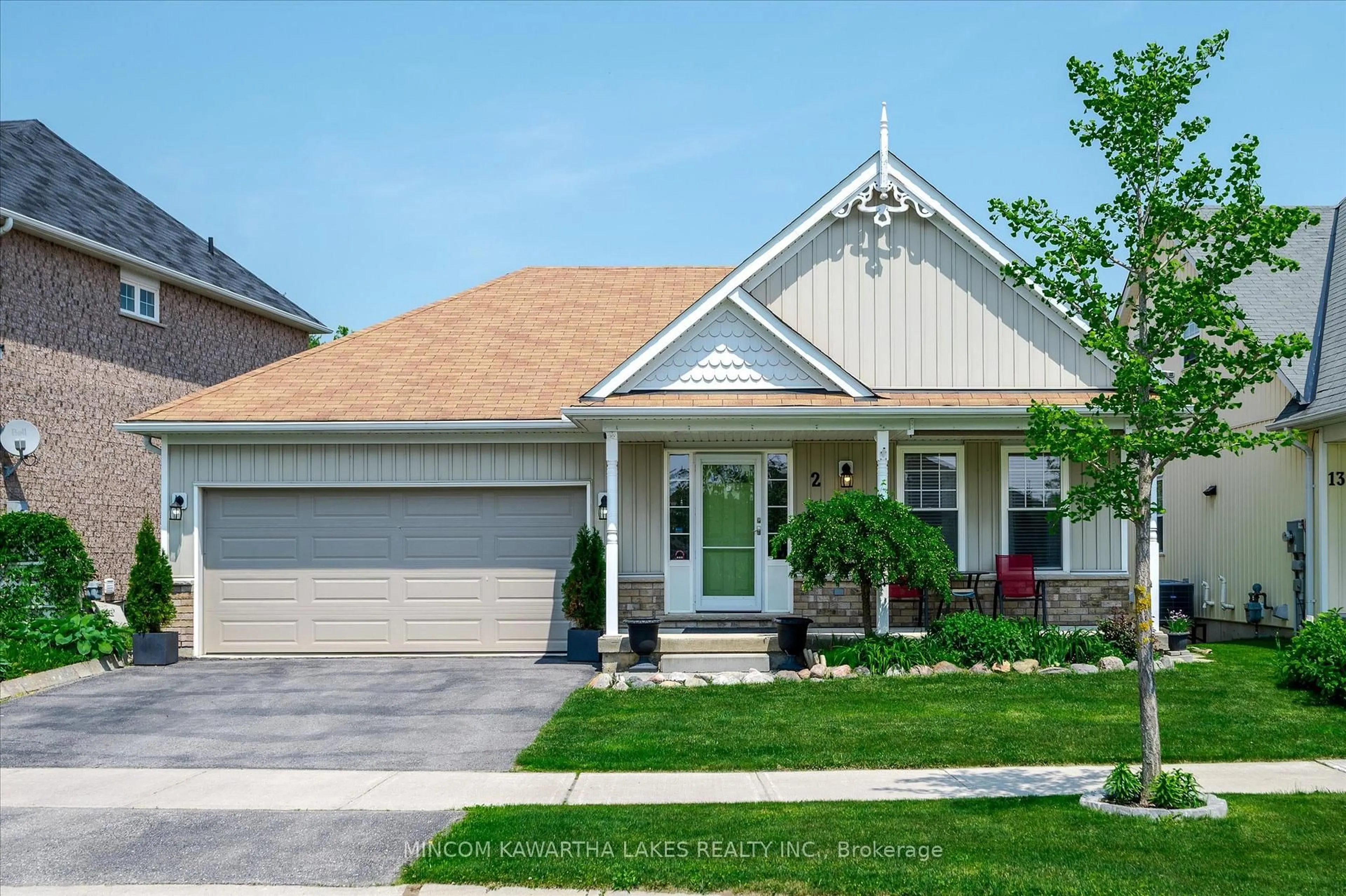 Home with vinyl exterior material, street for 2 Peace Cres, Peterborough North Ontario K9H 0C1