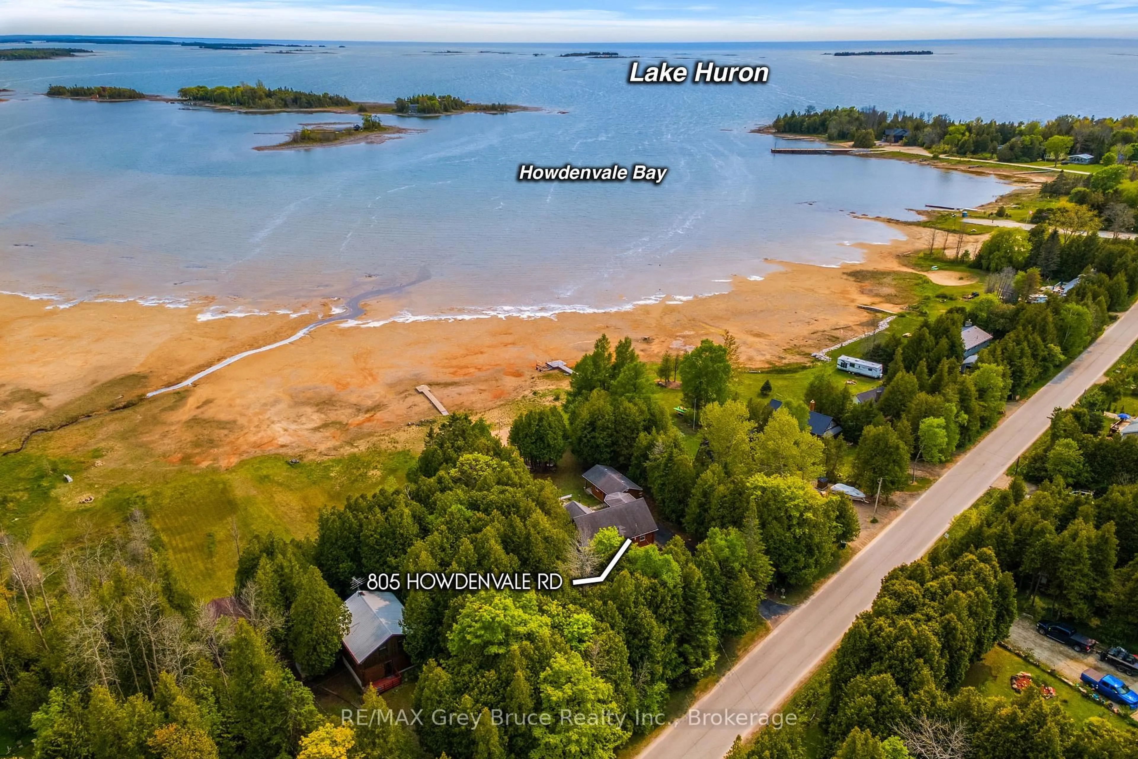 A pic from outside/outdoor area/front of a property/back of a property/a pic from drone, water/lake/river/ocean view for 805 Howdenvale Rd, South Bruce Peninsula Ontario N0H 2T0