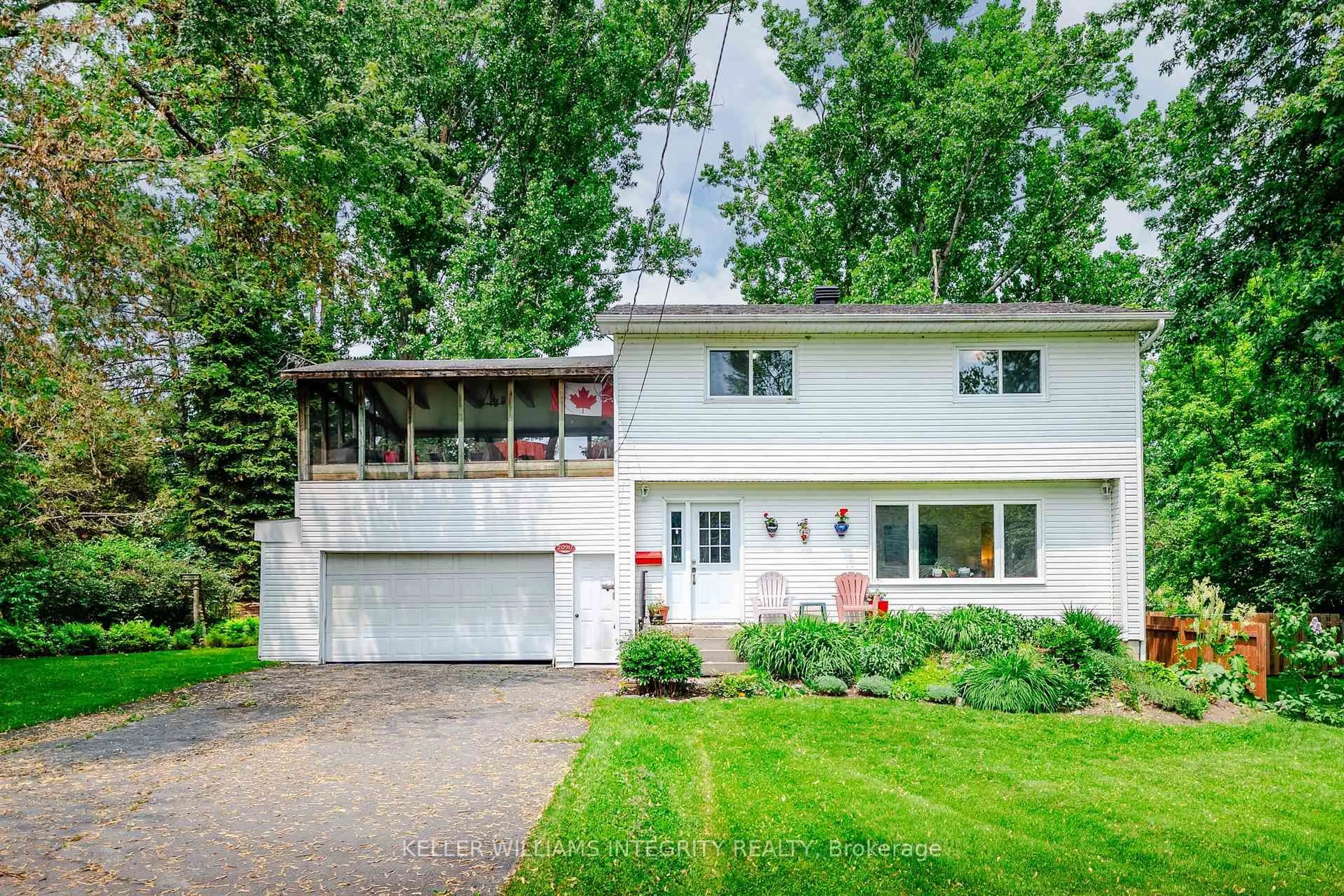 Home with vinyl exterior material, street for 20917 Oliver Lane, South Glengarry Ontario K0C 1N0