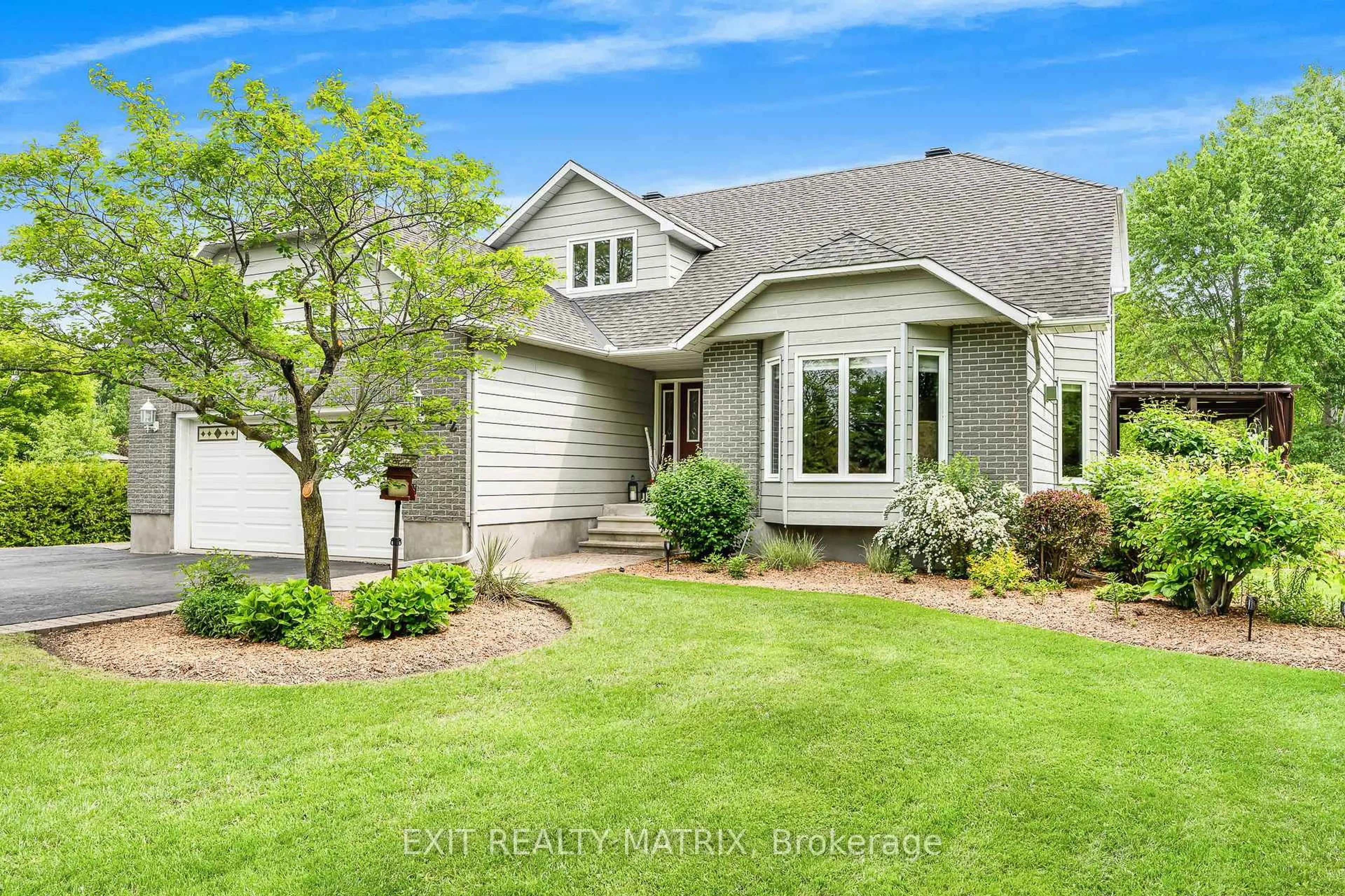 Home with vinyl exterior material, street for 882 Du Castor Rd, The Nation Ontario K0A 3C0