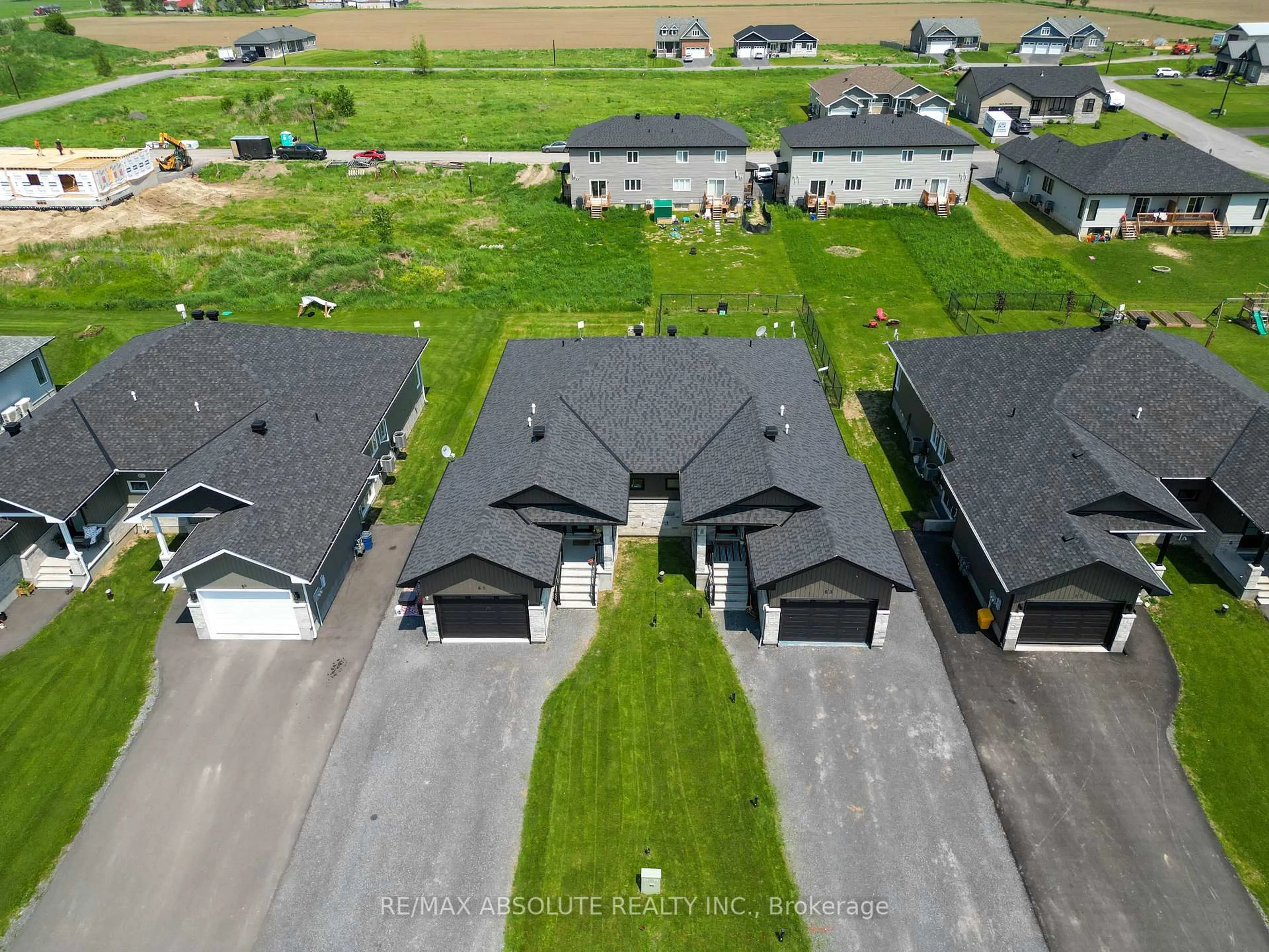 A pic from outside/outdoor area/front of a property/back of a property/a pic from drone, street for 61-63 Adam St, The Nation Ontario K0A 3C0