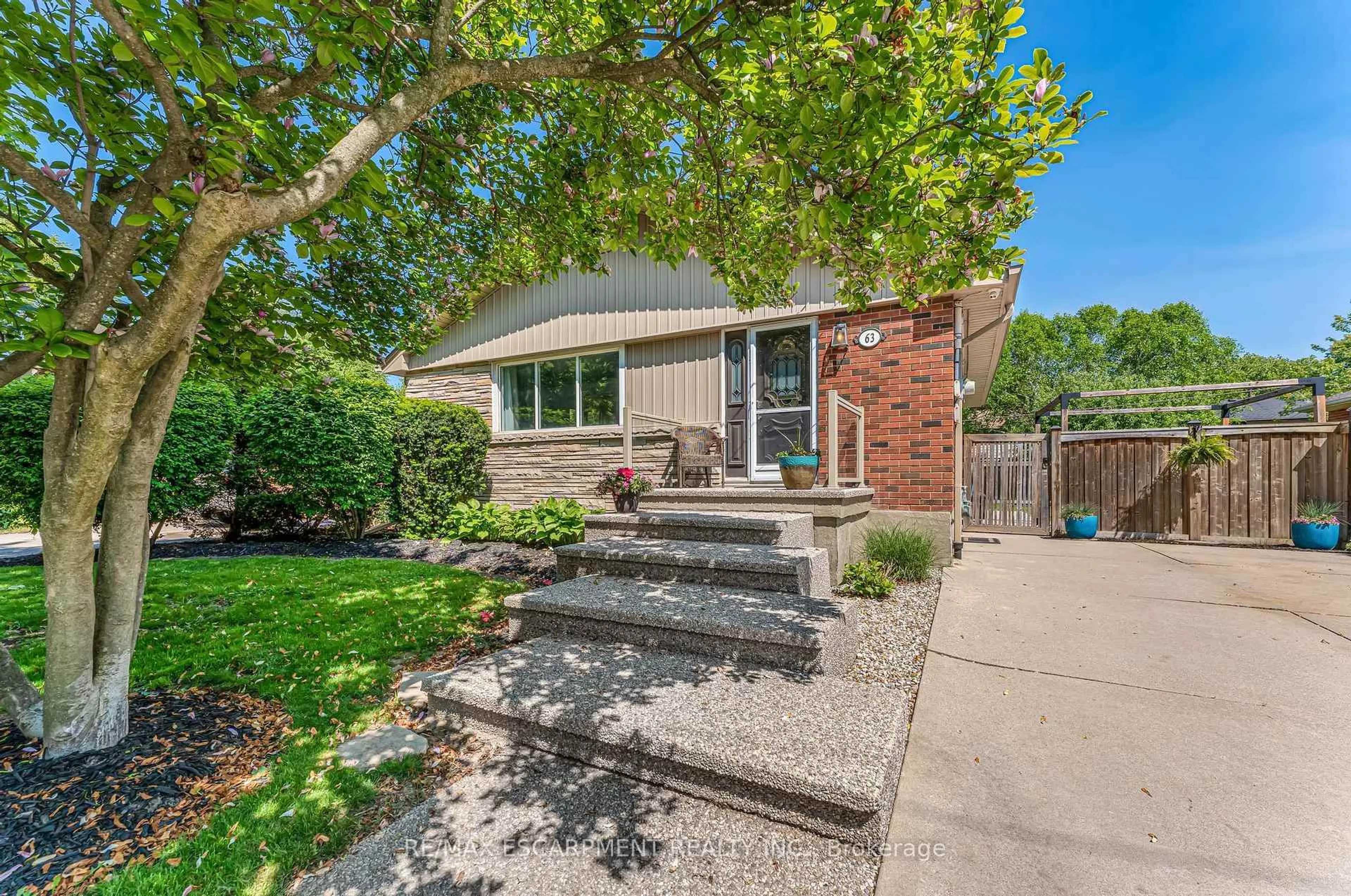 Home with brick exterior material, street for 63 West 25th St, Hamilton Ontario L9C 4W9