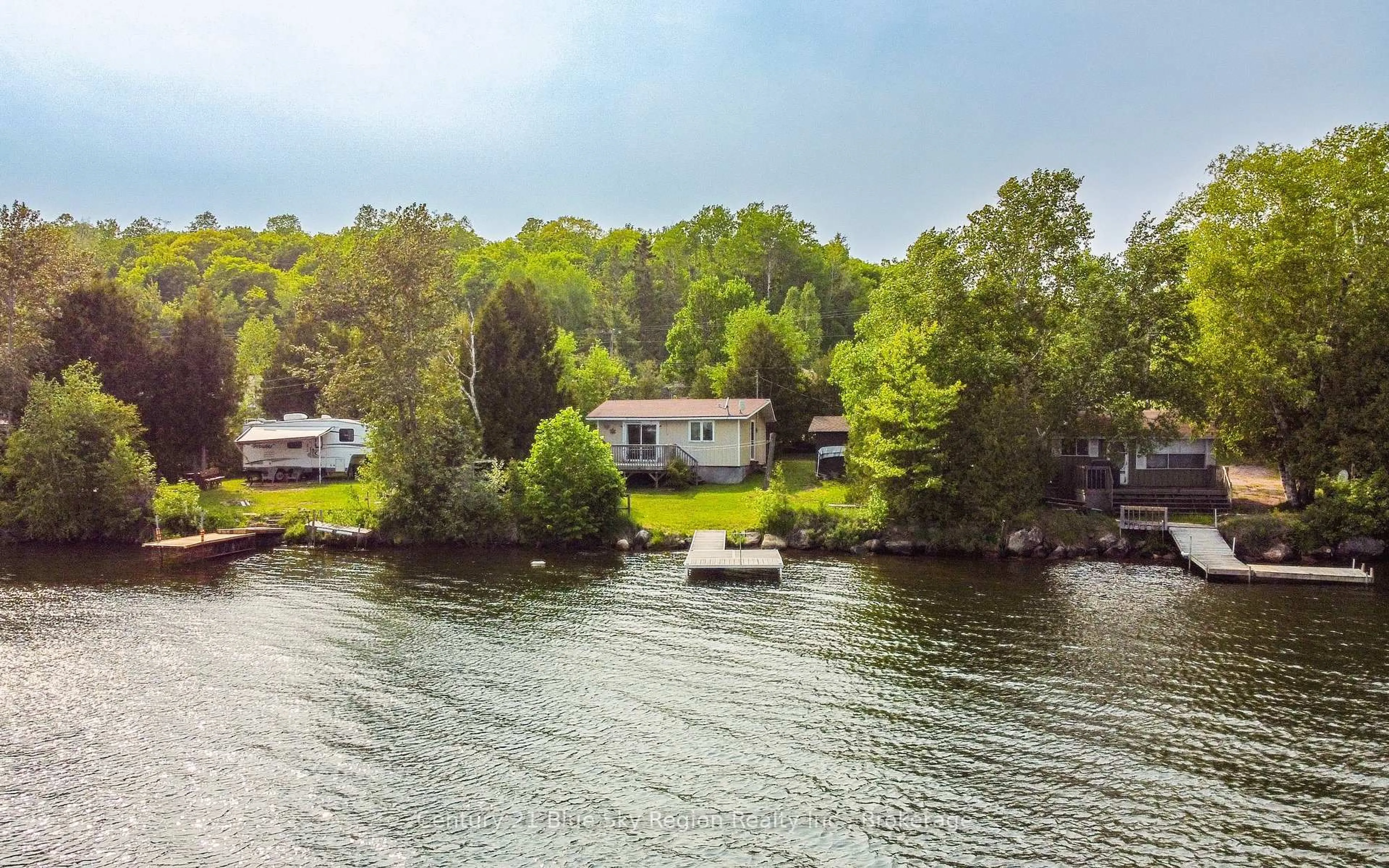 A pic from outside/outdoor area/front of a property/back of a property/a pic from drone, water/lake/river/ocean view for 652 Astorville Rd #2, East Ferris Ontario P0H 1B0