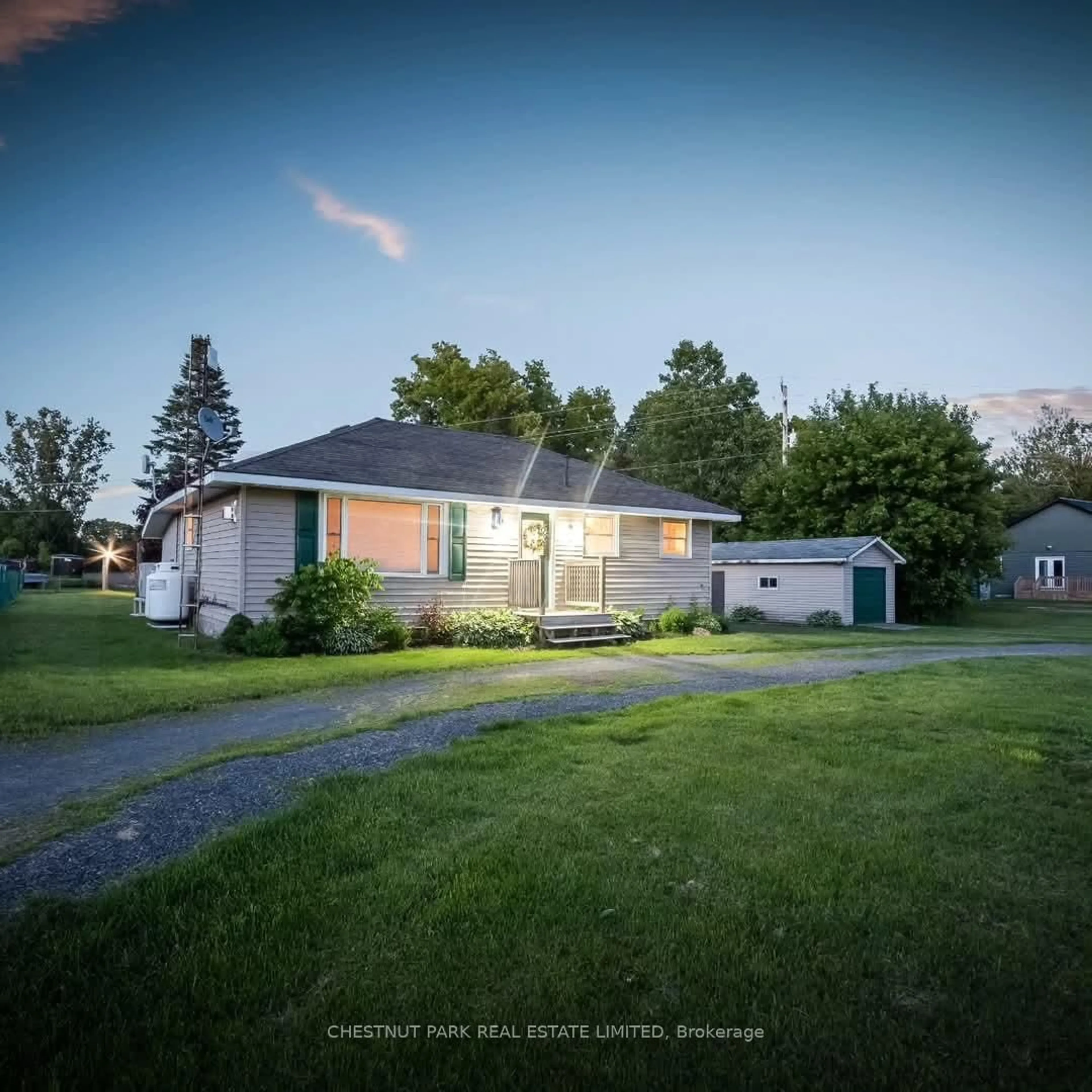 A pic from outside/outdoor area/front of a property/back of a property/a pic from drone, street for 1805 County Road 10, Prince Edward County Ontario K0K 1P0