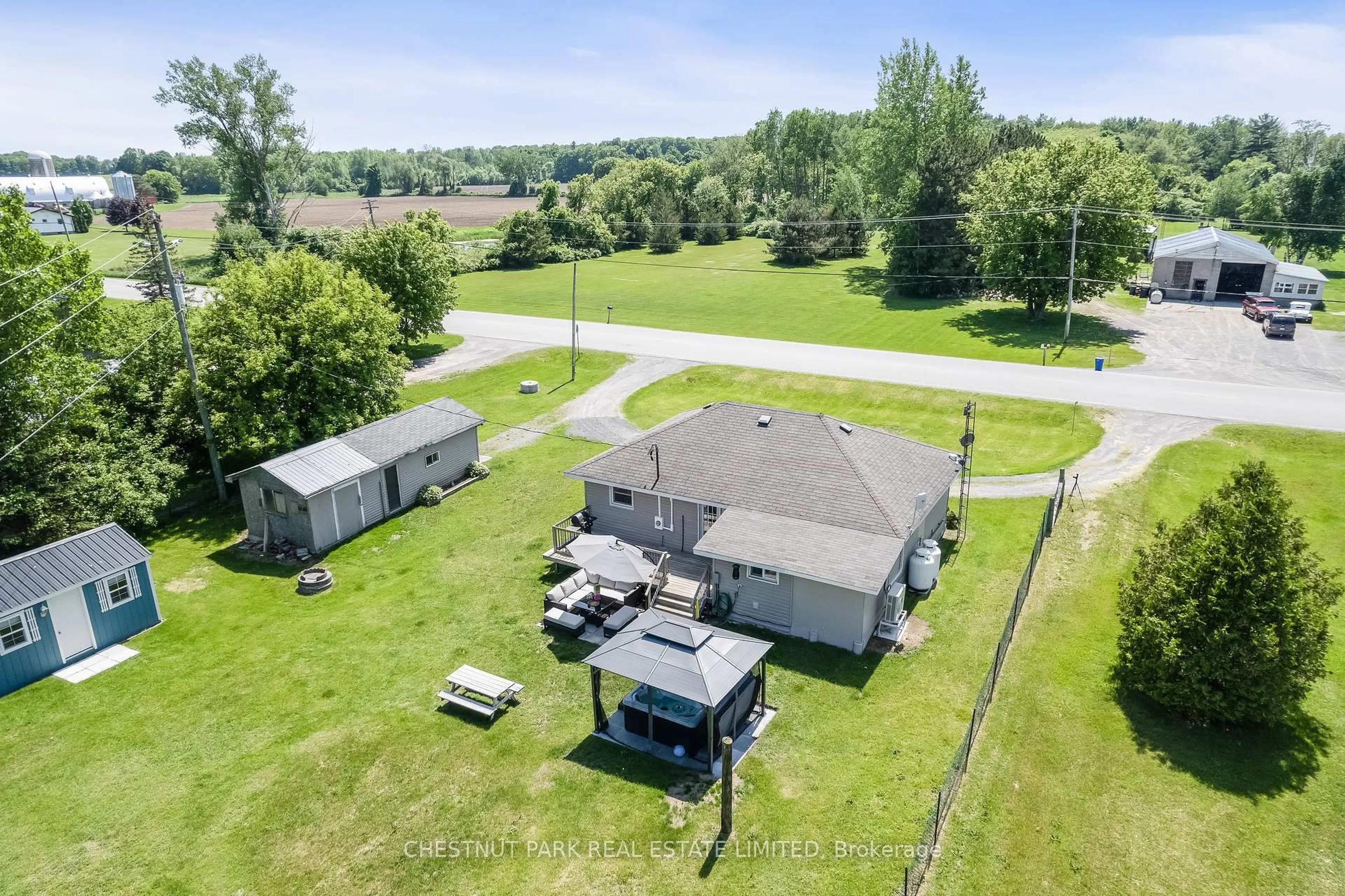 A pic from outside/outdoor area/front of a property/back of a property/a pic from drone, water/lake/river/ocean view for 1805 County Road 10, Prince Edward County Ontario K0K 1P0