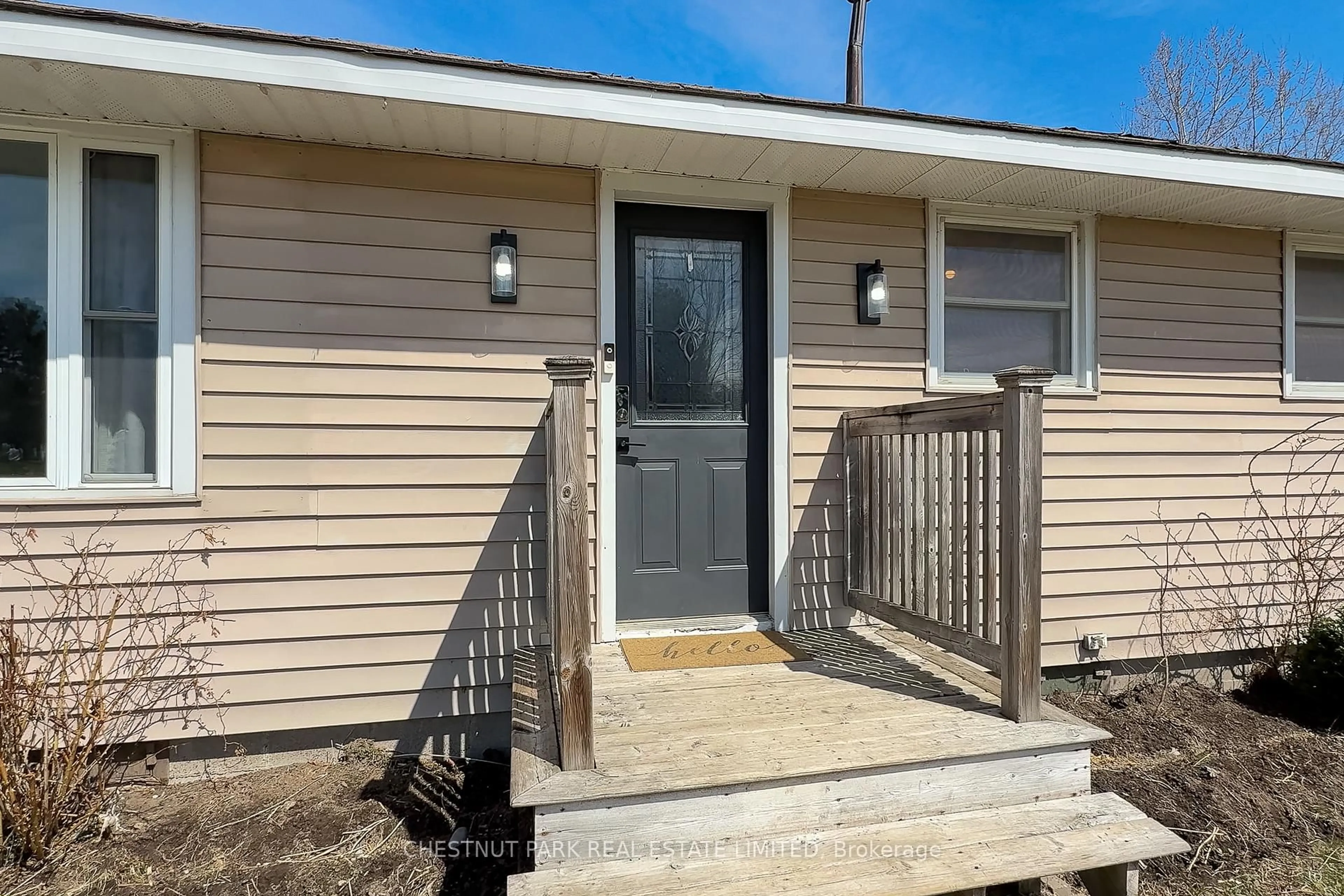 Home with vinyl exterior material, street for 1805 County Road 10, Prince Edward County Ontario K0K 1P0