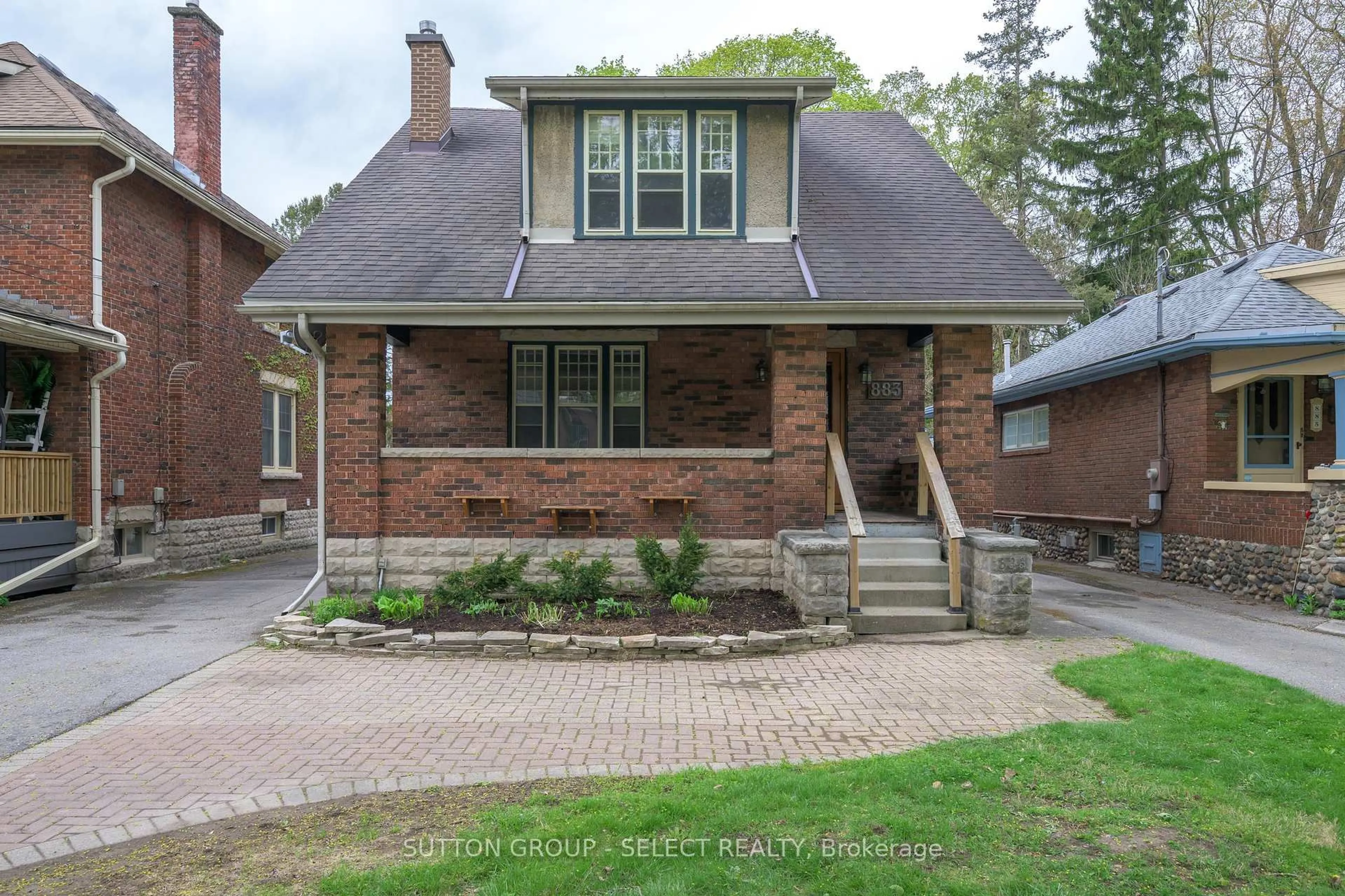 Home with brick exterior material, street for 883 WATERLOO St, London East Ontario N6A 3W8