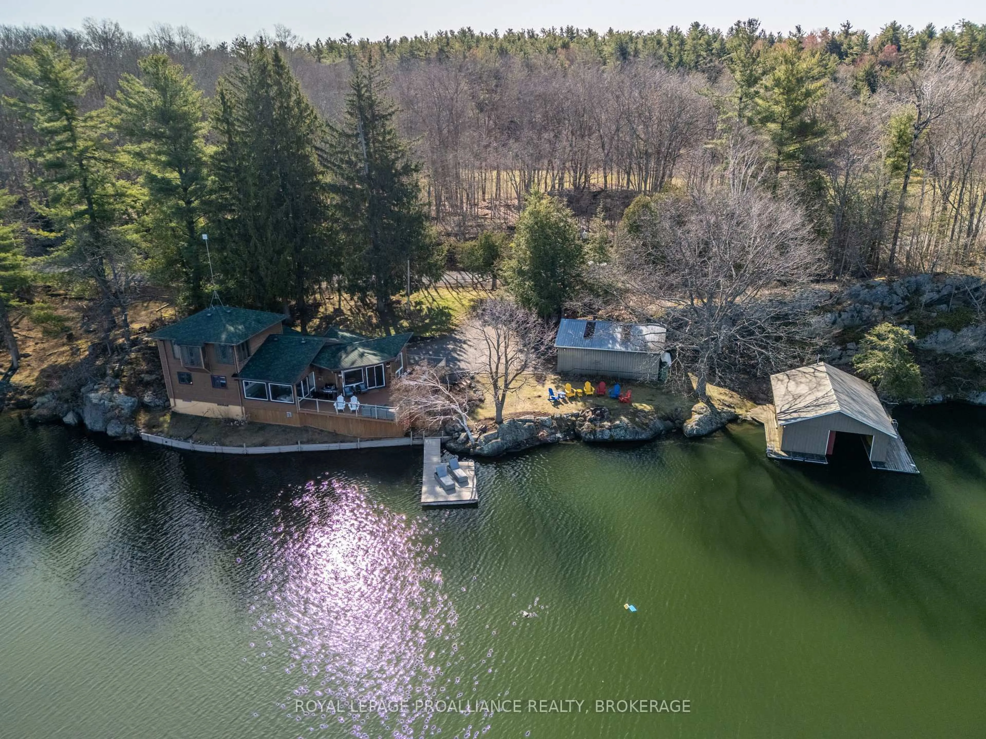 A pic from outside/outdoor area/front of a property/back of a property/a pic from drone, water/lake/river/ocean view for 4808 Leo Lake Rd, Seeley's Bay Ontario K0H 2N0