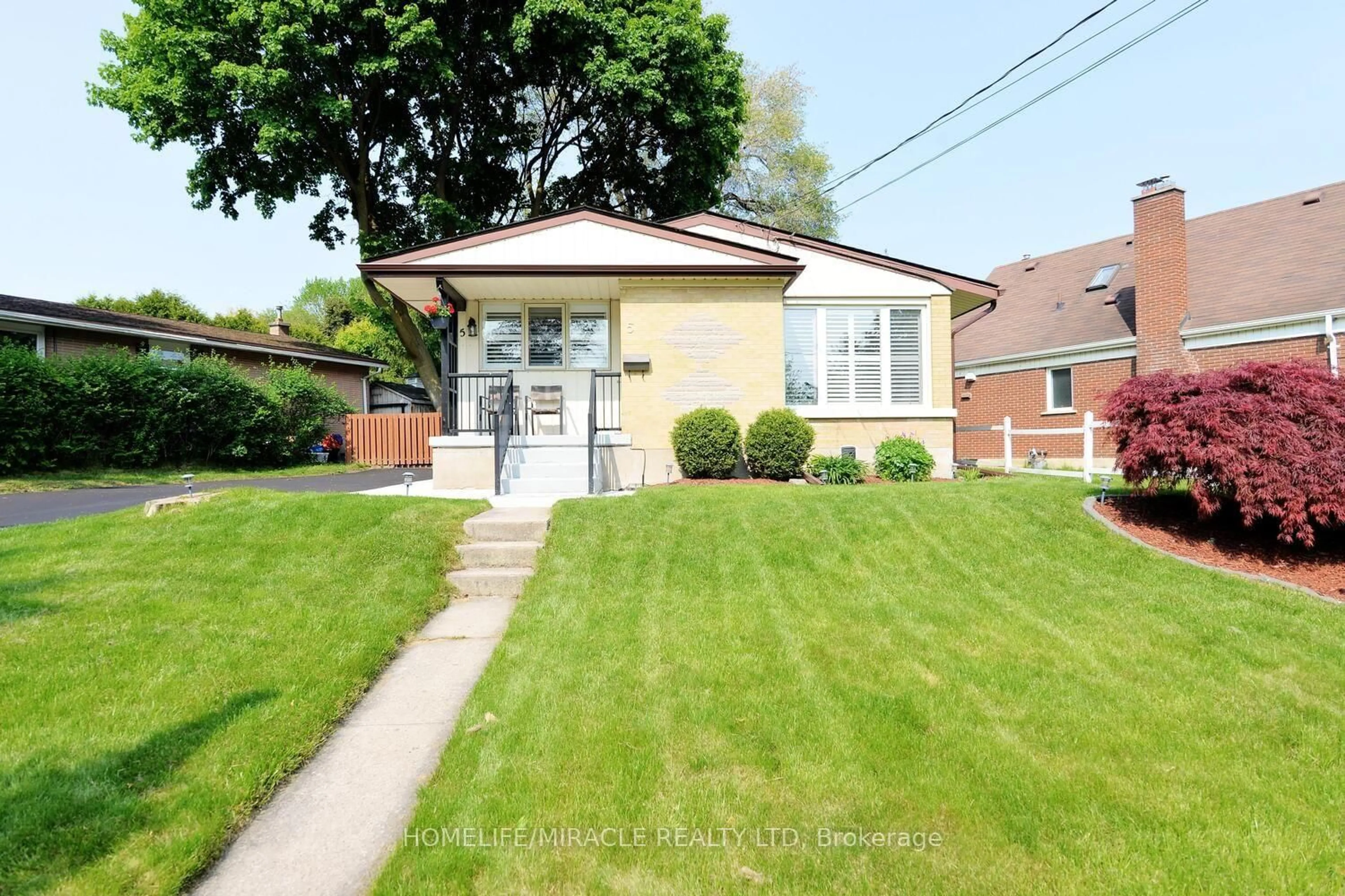 Home with brick exterior material, street for 5 Lincoln Cres, Guelph Ontario N1E 1Y7