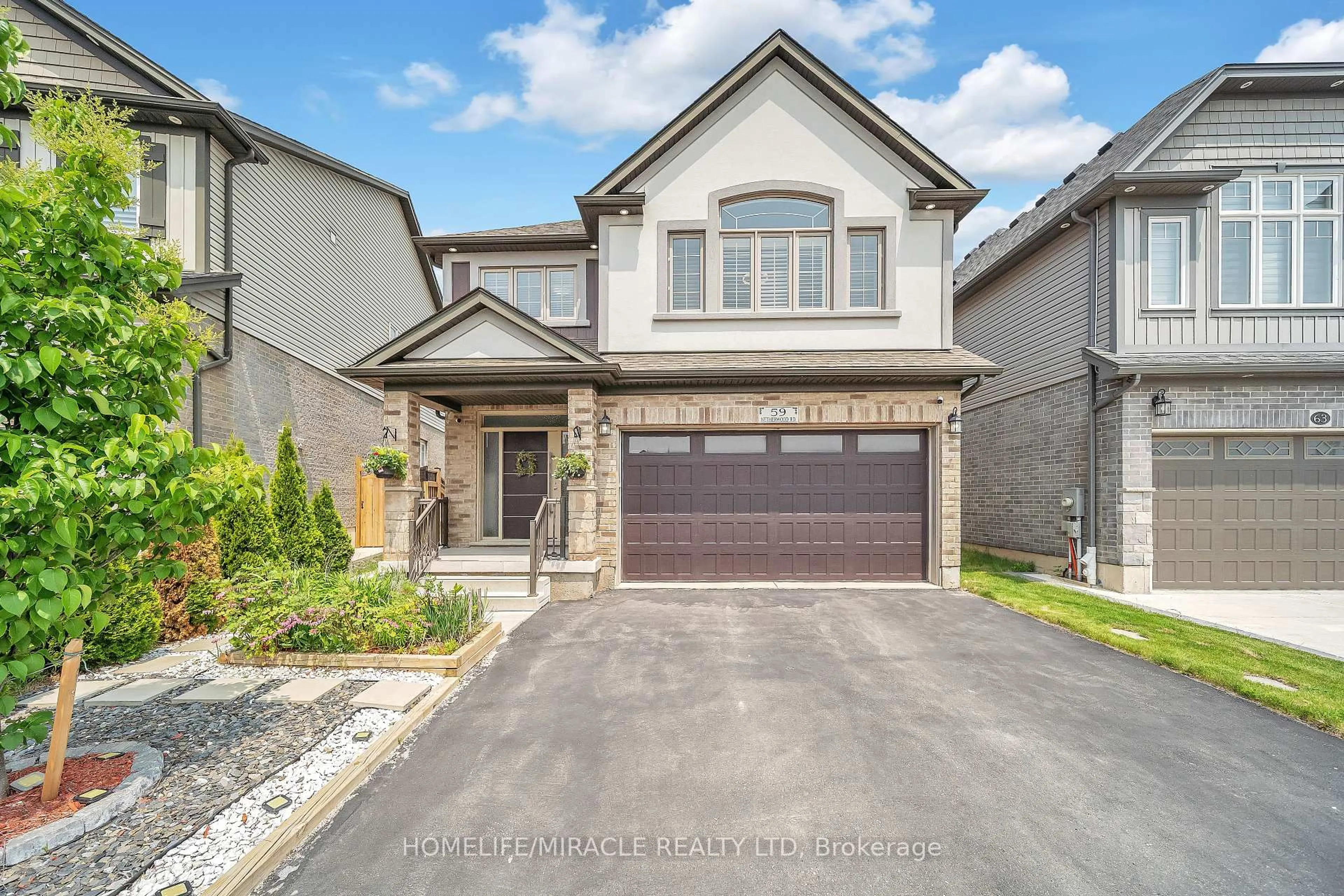 Home with brick exterior material, street for 59 Netherwood Rd, Kitchener Ontario N2P 0E4