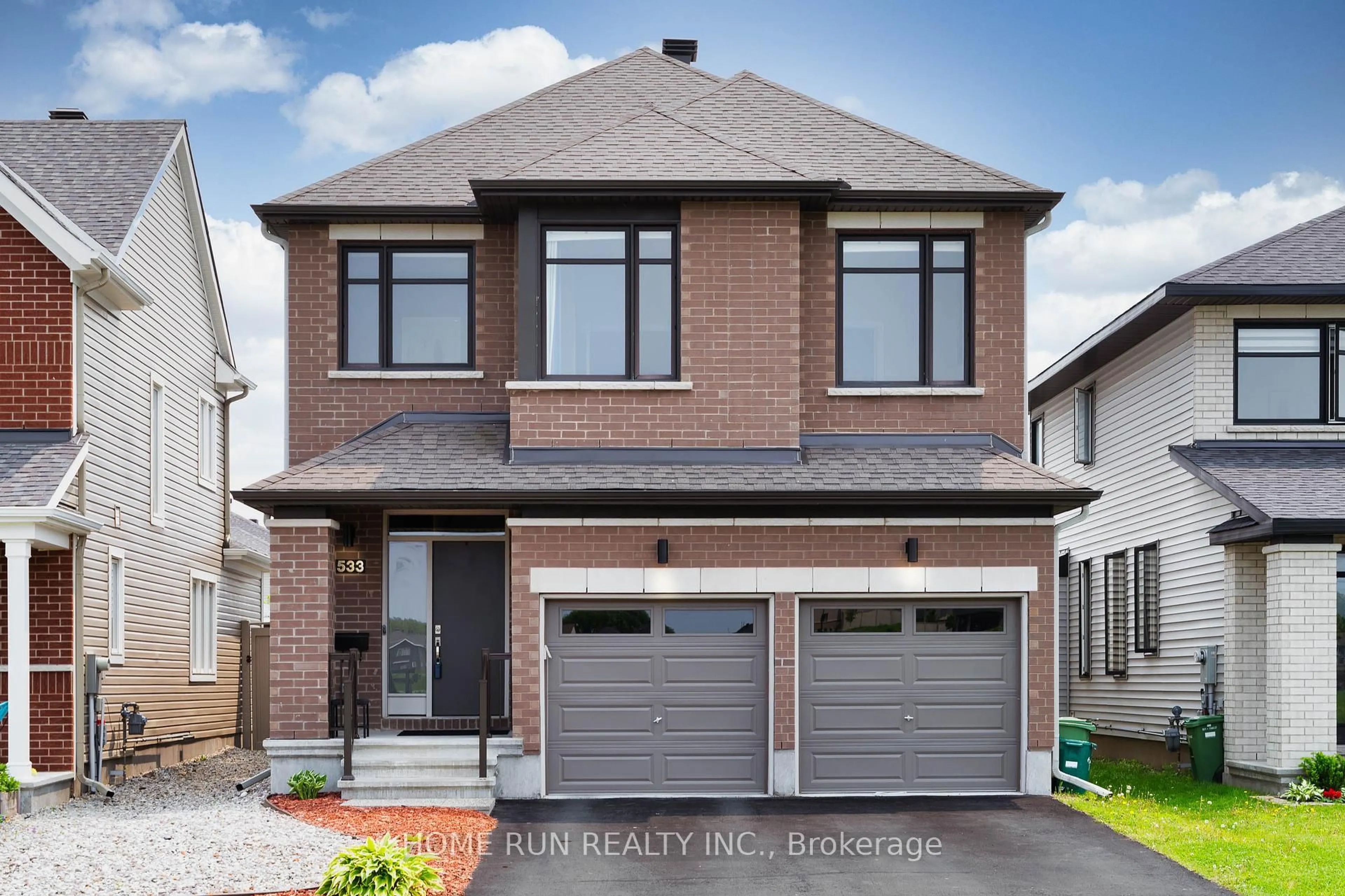 Home with brick exterior material, street for 533 Honeylocust Ave, Stittsville Ontario K2V 0L8