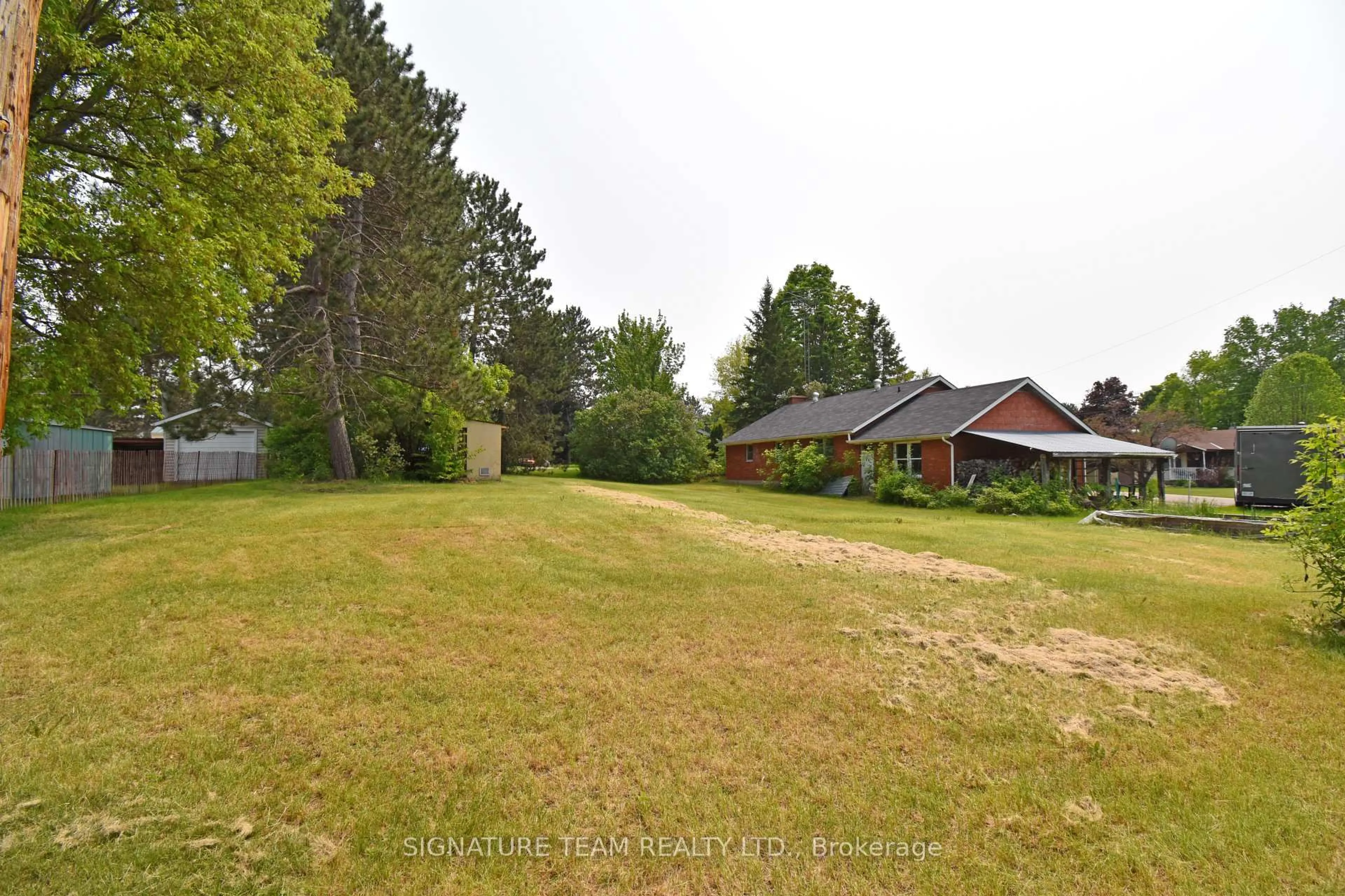 A pic from outside/outdoor area/front of a property/back of a property/a pic from drone, forest/trees view for 22 Elm St, Killaloe Ontario K0J 2A0