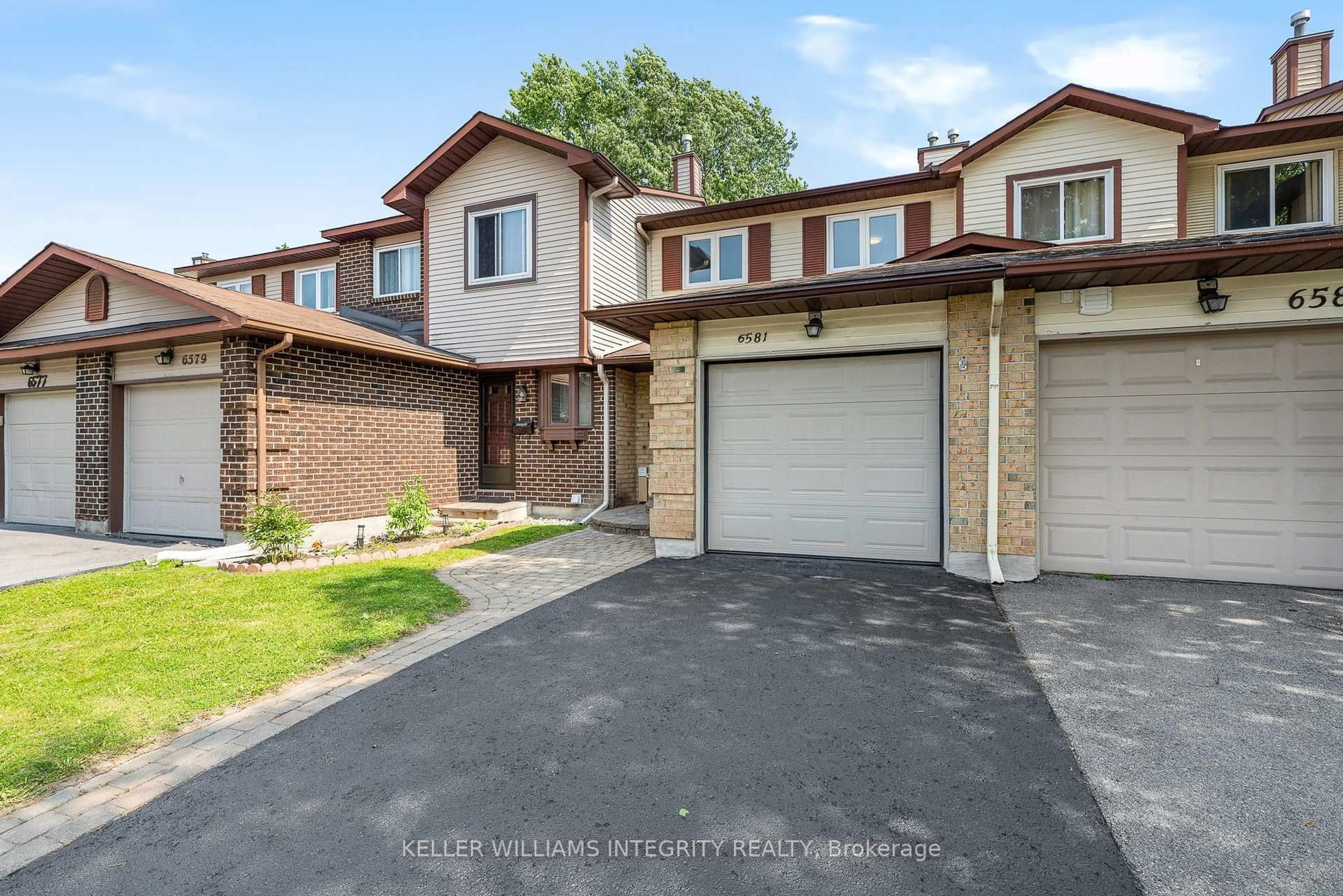 Home with brick exterior material, street for 6581 Colony Sq #4, Ottawa Ontario K1C 3E4