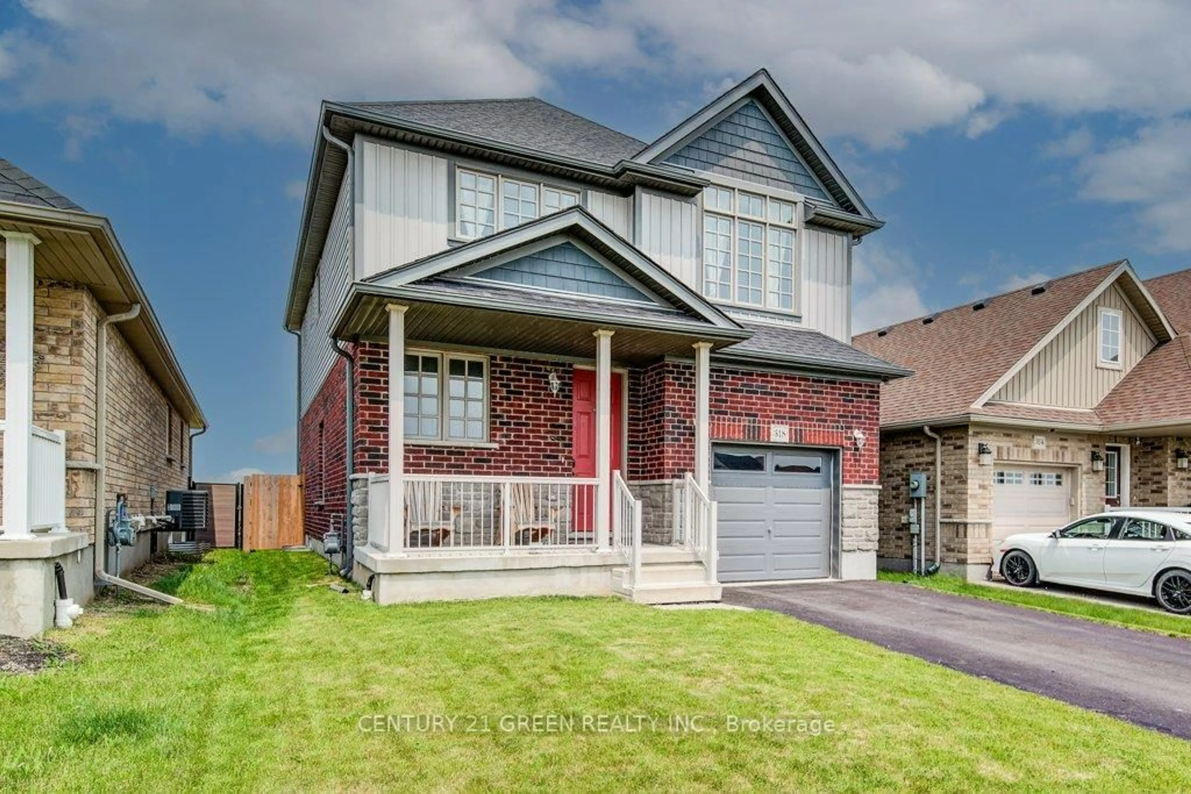 Home with brick exterior material, street for 318 William St, Woolwich Ontario N3B 0B5
