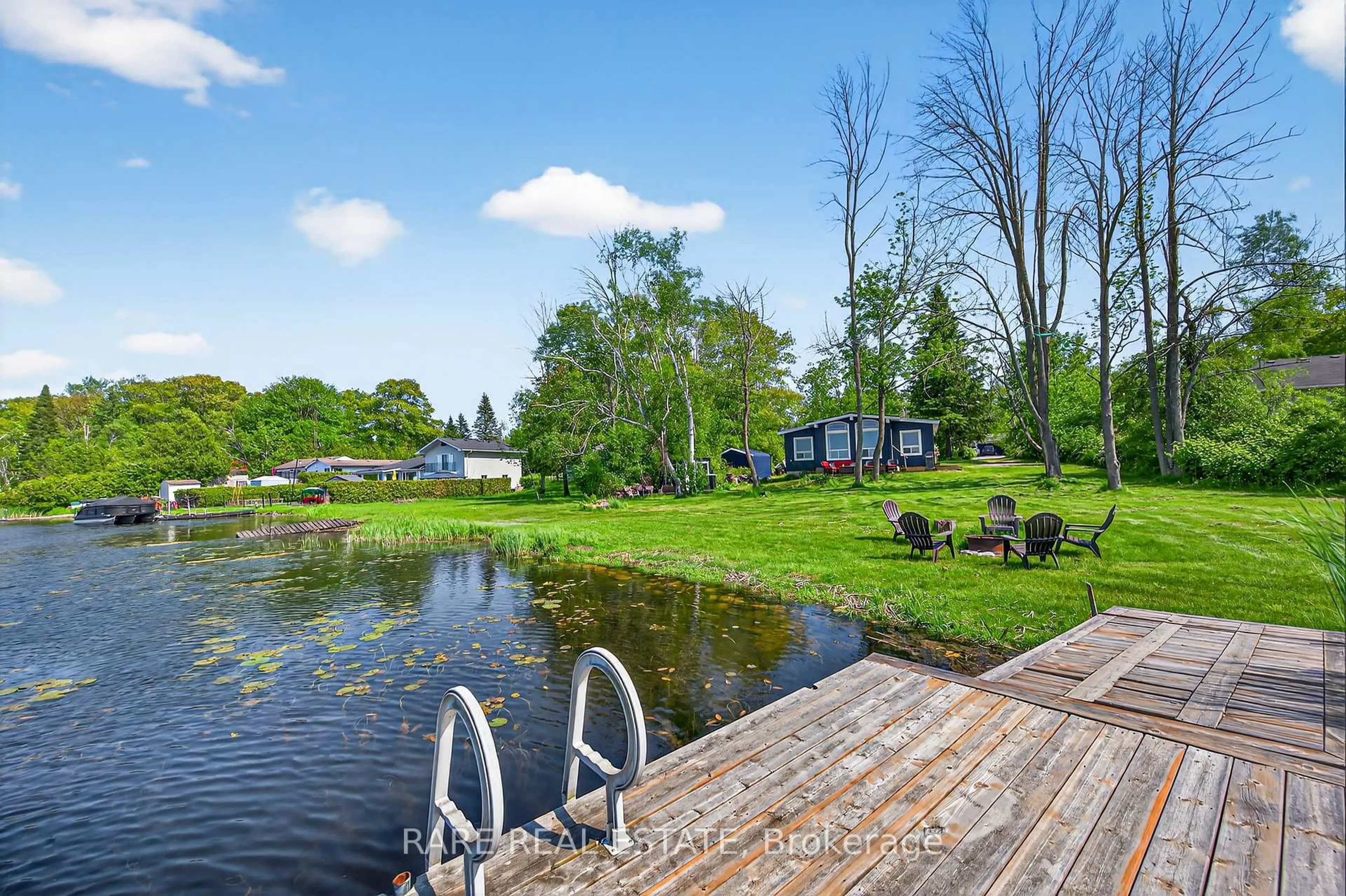 A pic from outside/outdoor area/front of a property/back of a property/a pic from drone, water/lake/river/ocean view for 168 Charlore Park Dr, Kawartha Lakes Ontario K0L 2W0